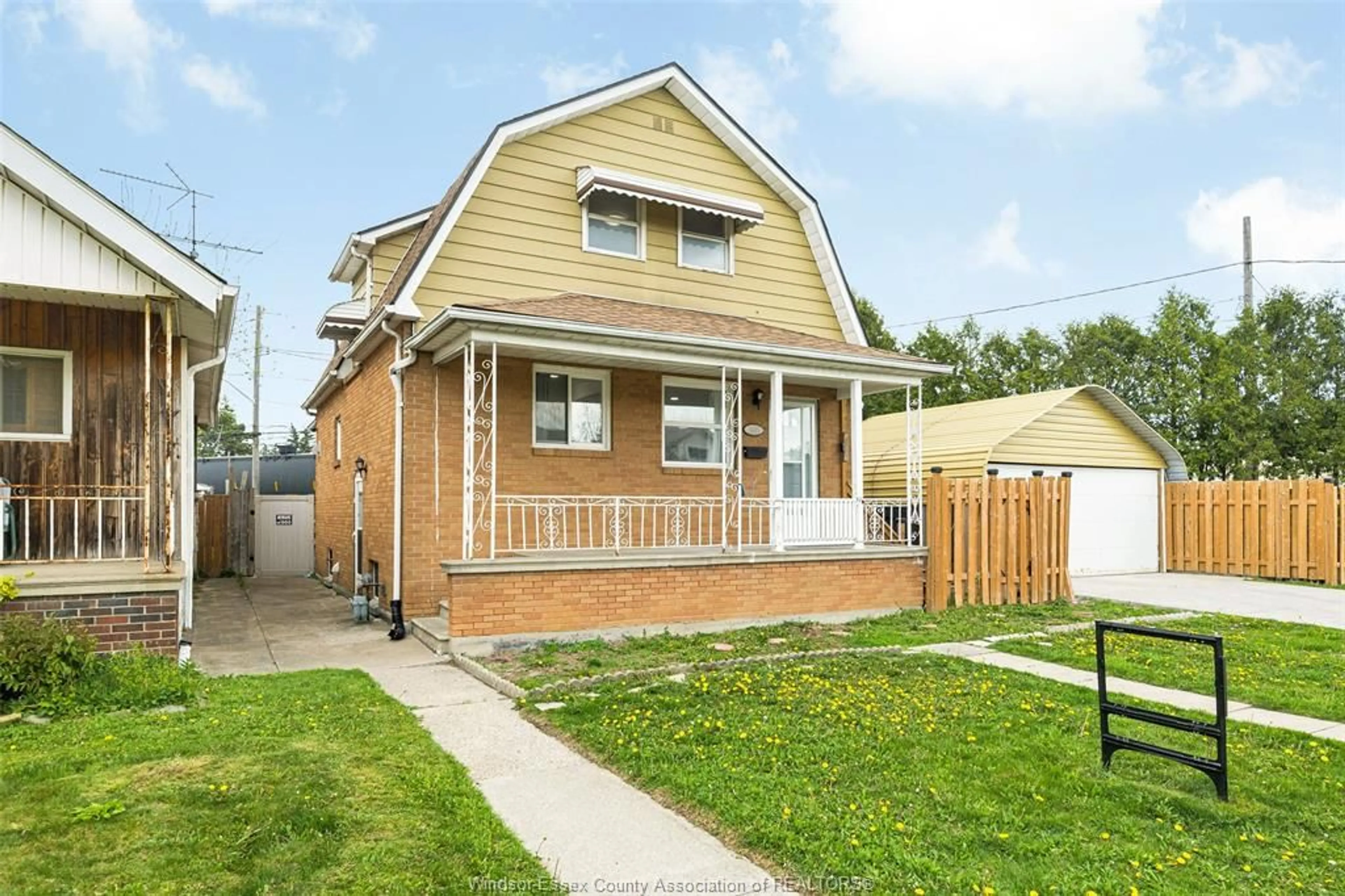 Home with vinyl exterior material, street for 1692 HALL Ave, Windsor Ontario N8X 4S1