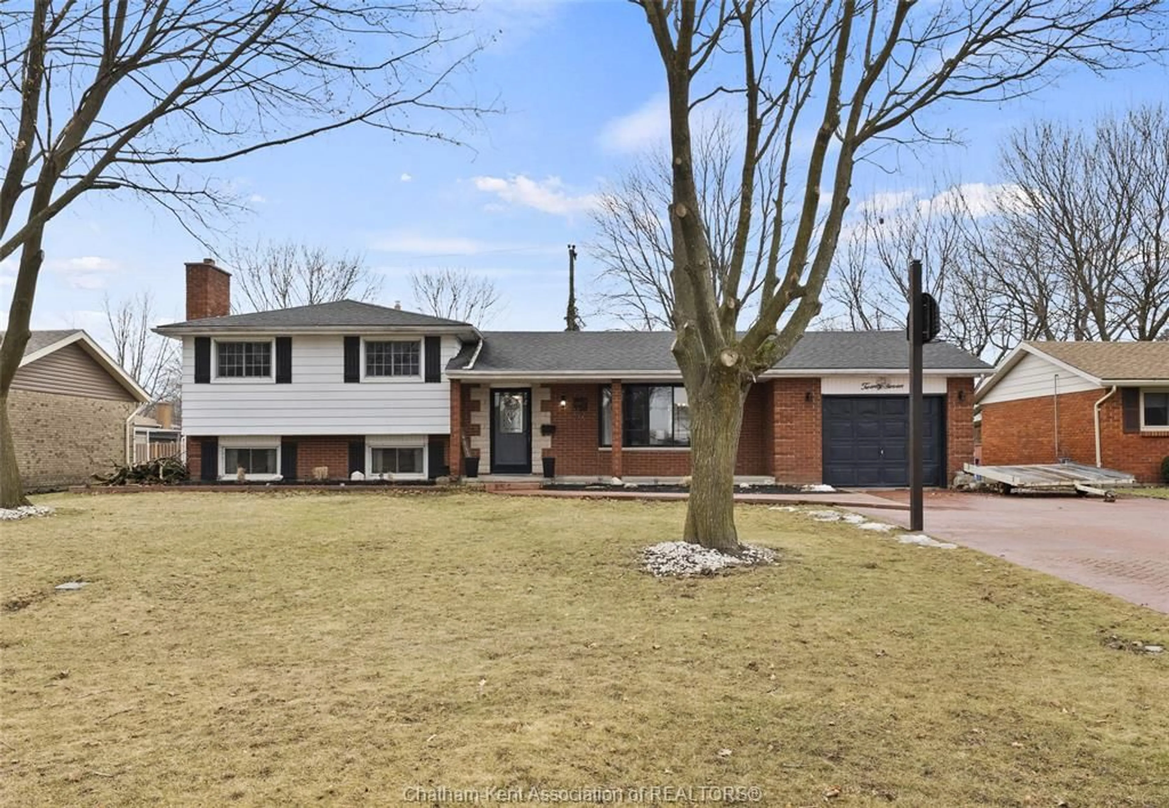 Home with brick exterior material, street for 27 Lillian St, Wallaceburg Ontario N8A 4W2