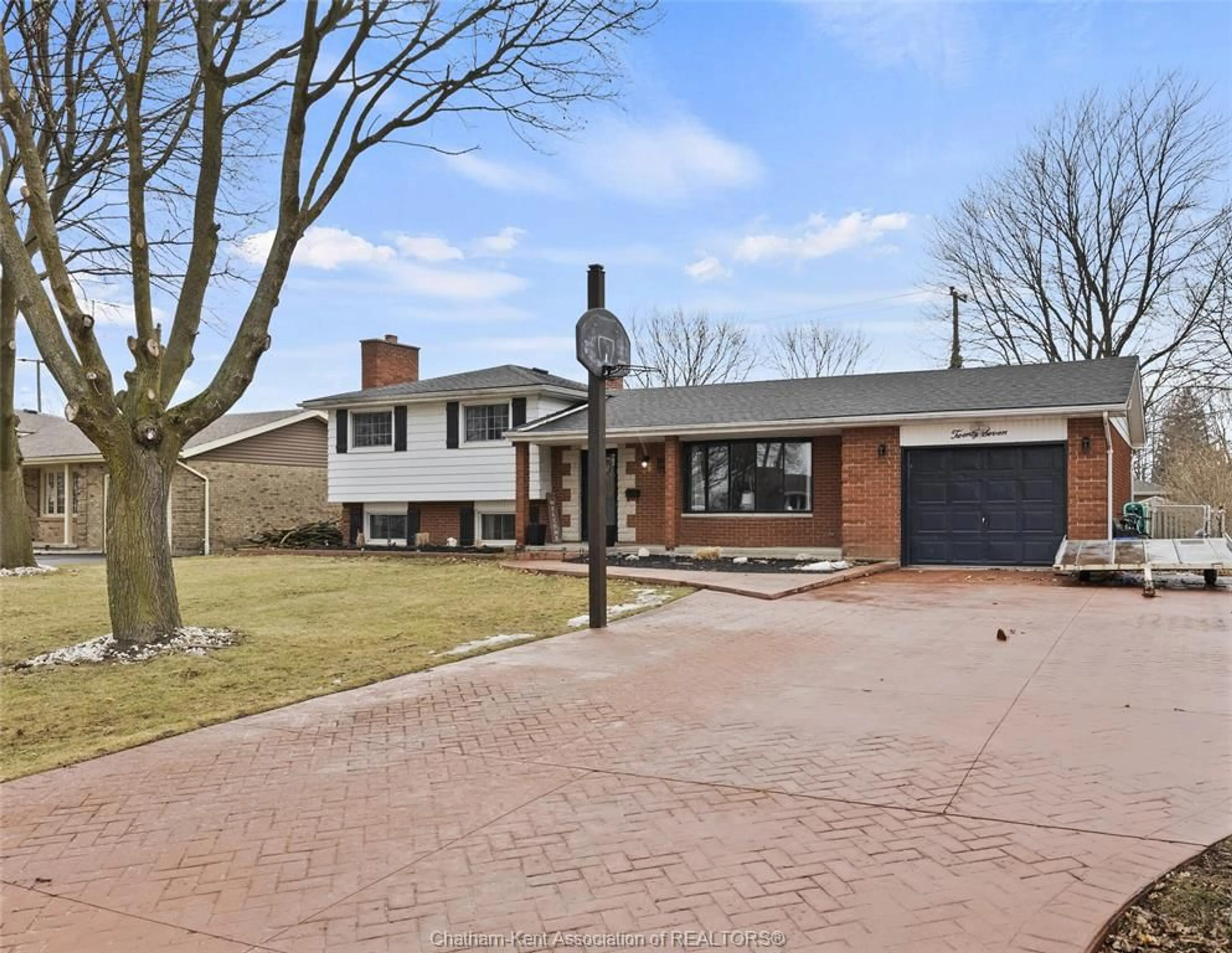 Home with brick exterior material, street for 27 Lillian St, Wallaceburg Ontario N8A 4W2
