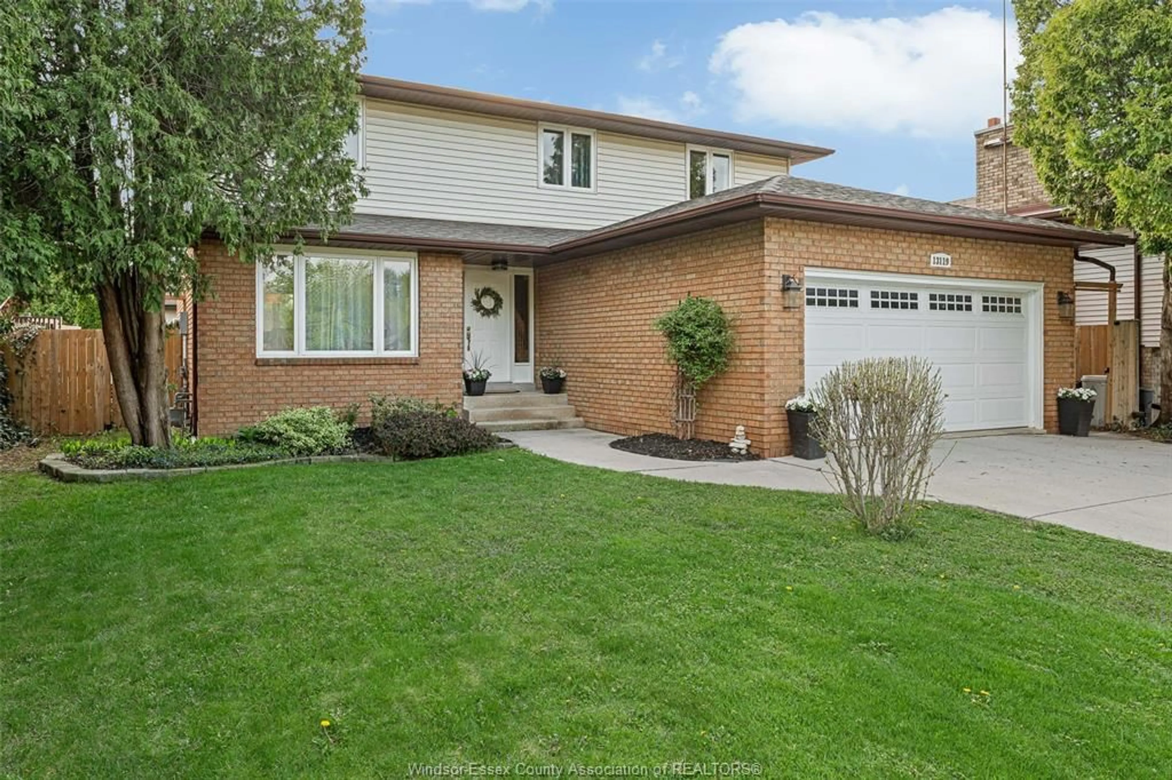 Home with brick exterior material, street for 13119 Dillon Dr, Tecumseh Ontario N8N 3J6