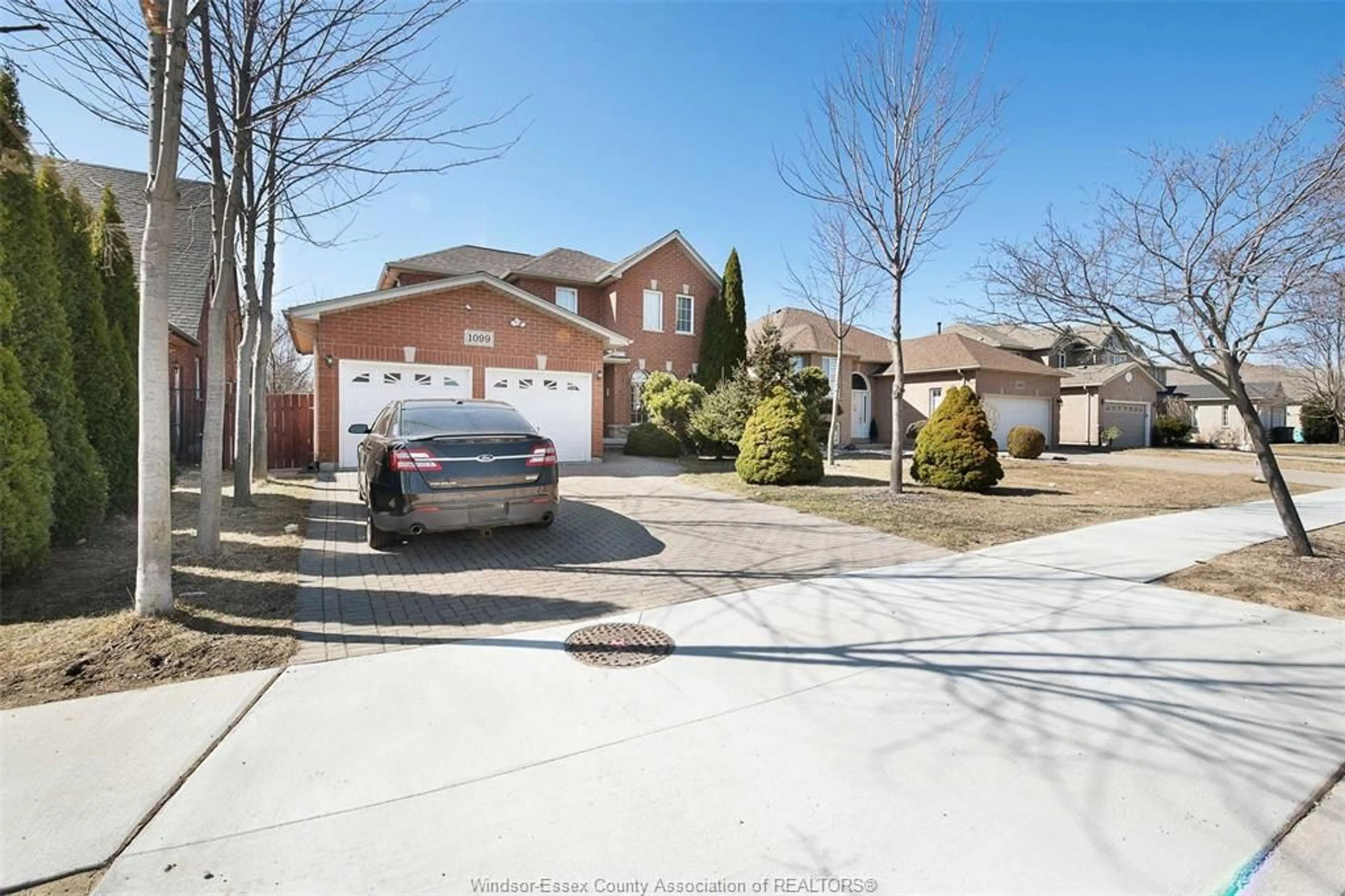A pic from outside/outdoor area/front of a property/back of a property/a pic from drone, street for 1099 CORA GREENWOOD Dr, Windsor Ontario N8P 1K3