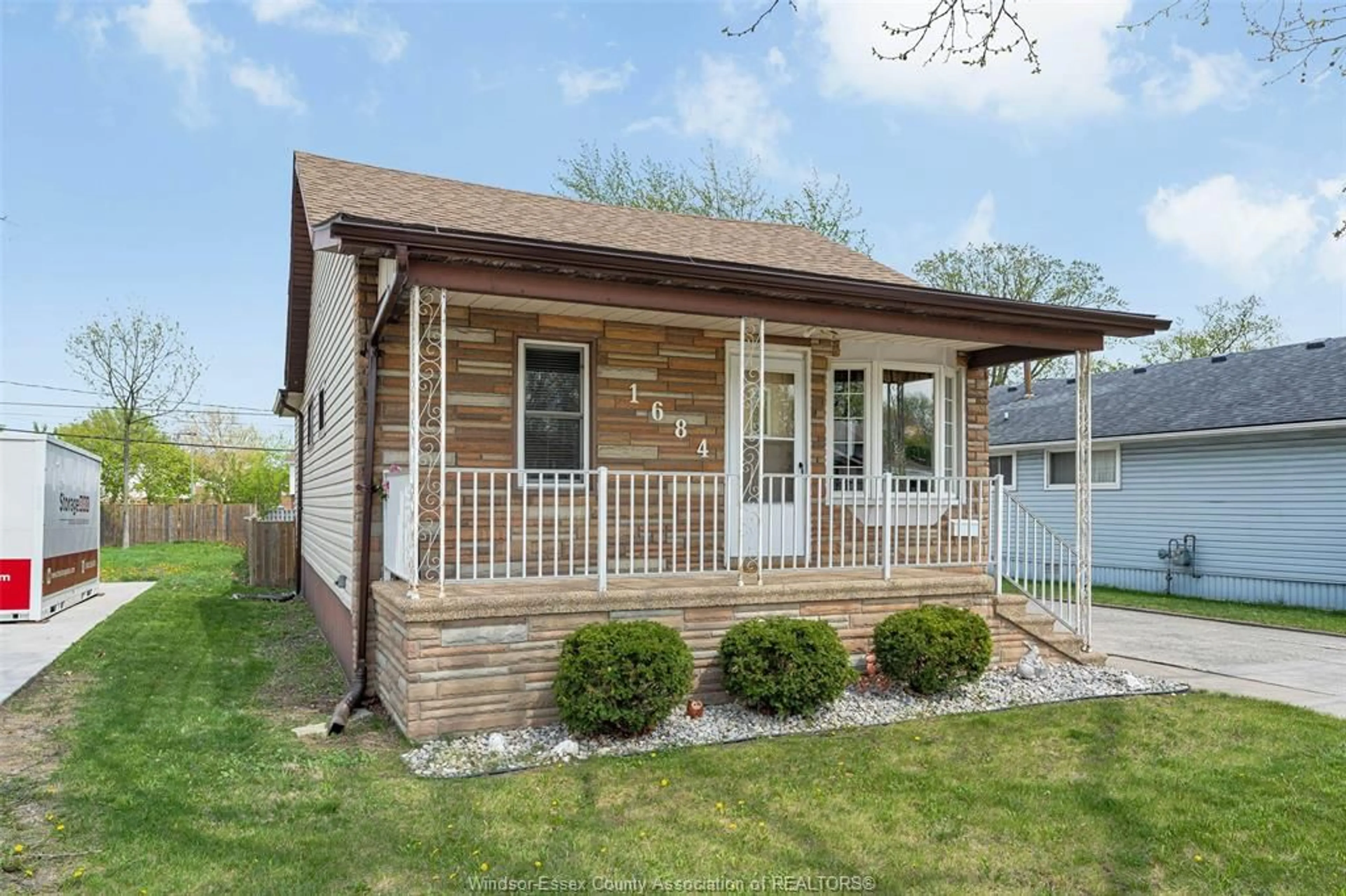 Home with vinyl exterior material, street for 1684 FORD Blvd, Windsor Ontario N8T 2E1