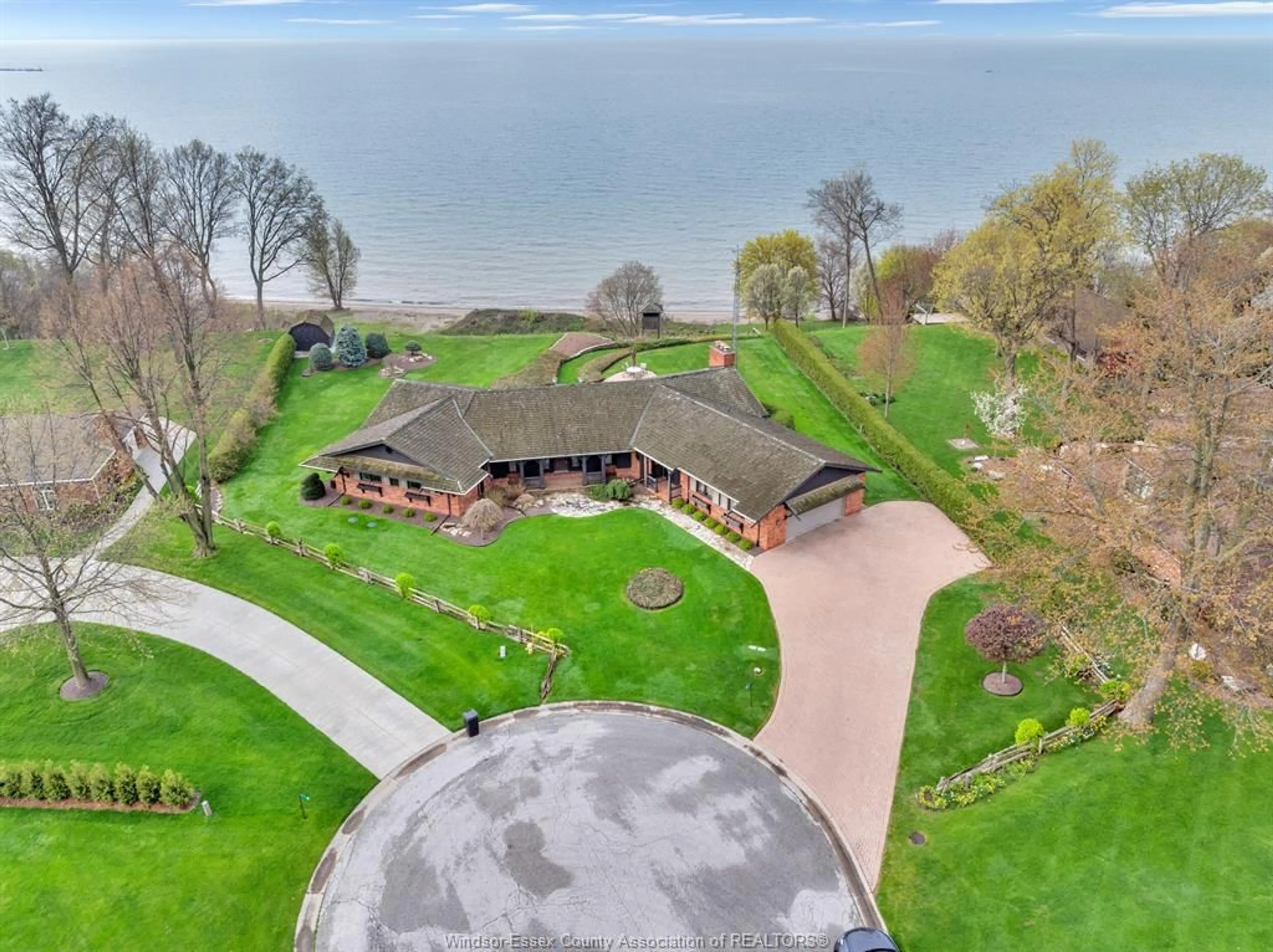 A pic from outside/outdoor area/front of a property/back of a property/a pic from drone, water/lake/river/ocean view for 15 FISCHER Cres, Leamington Ontario N8H 4S6