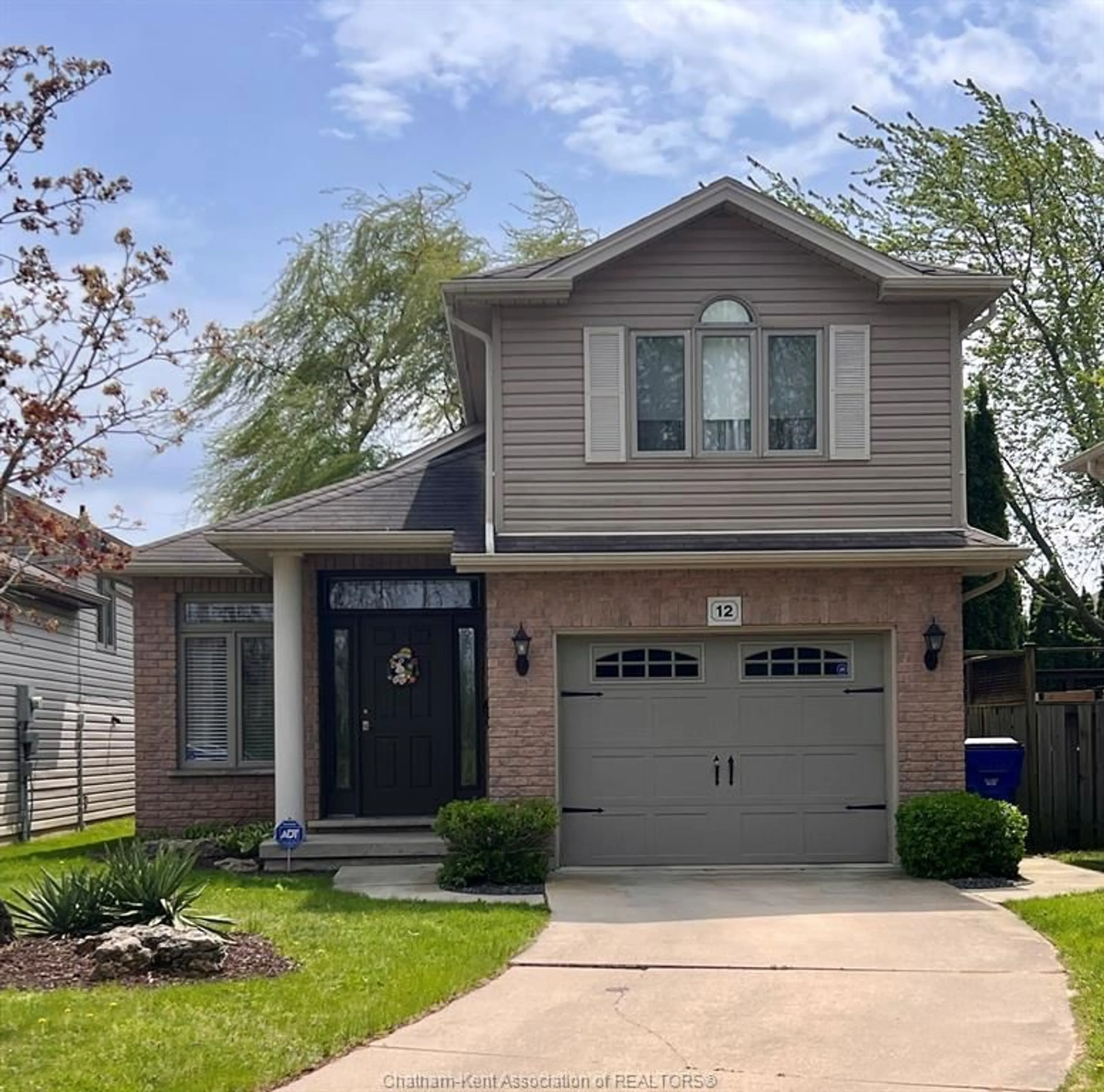 Home with brick exterior material, street for 12 Creekview Pl, Chatham Ontario N7L 0A2