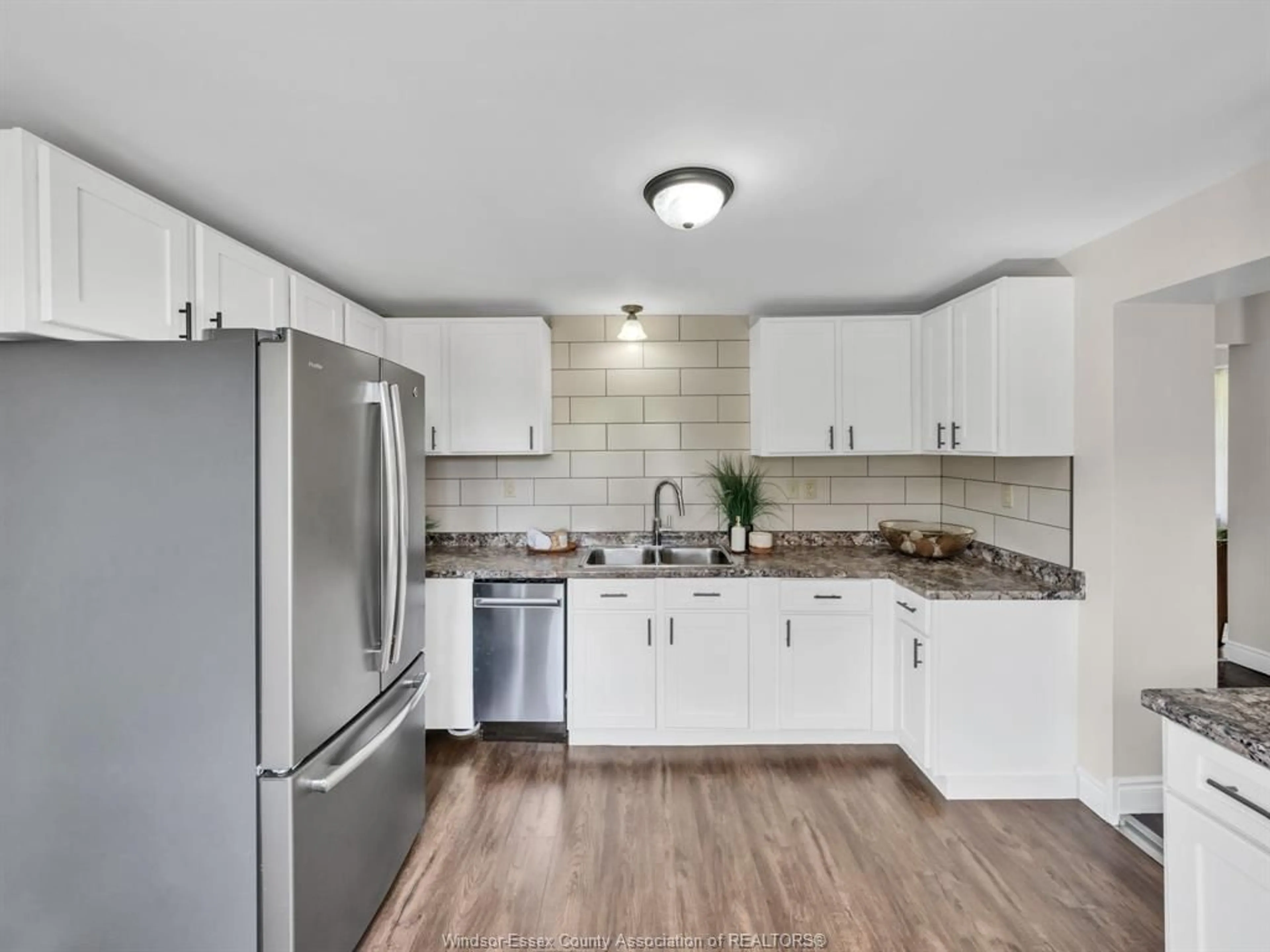 Open concept kitchen, ceramic/tile floor for 640 Talbot Rd East, Leamington Ontario N8H 3V6
