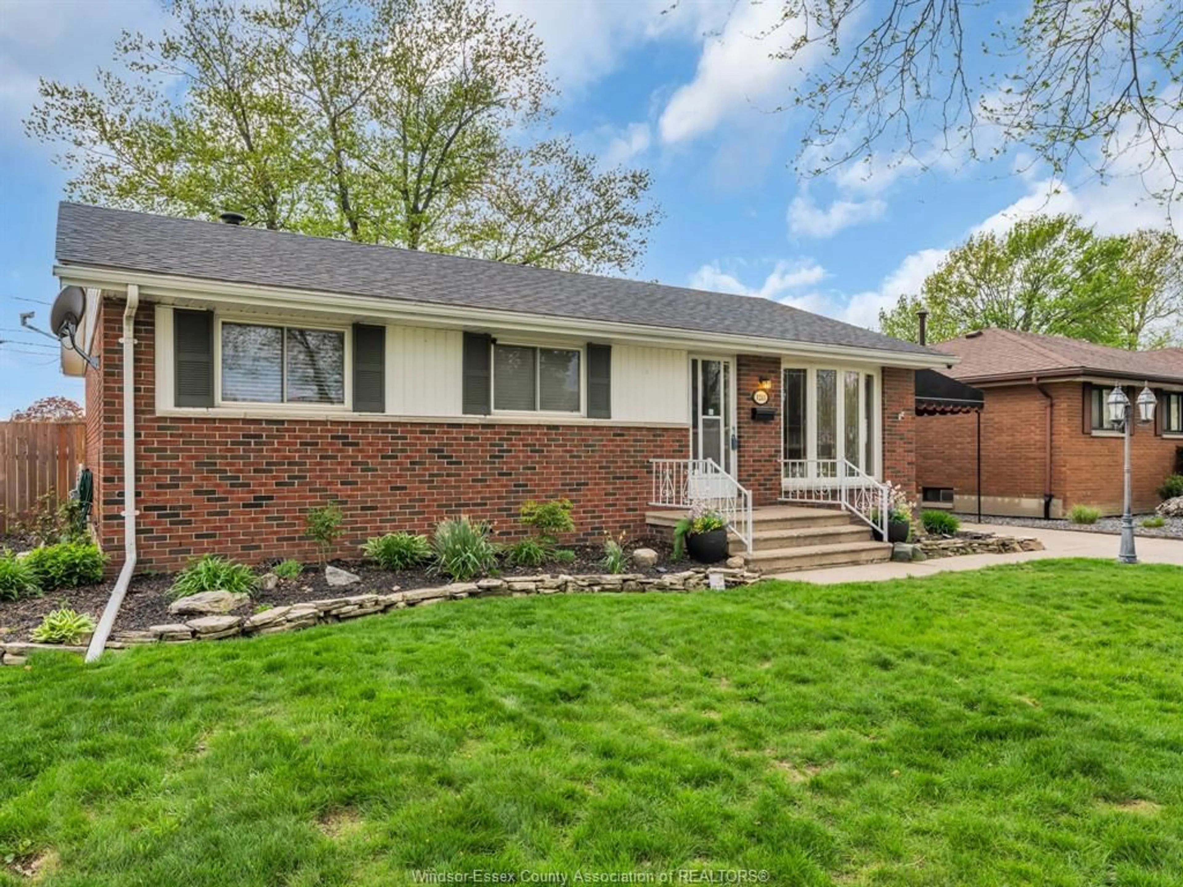 Home with brick exterior material, street for 1243 JANISSE Dr, Windsor Ontario N8S 2W2