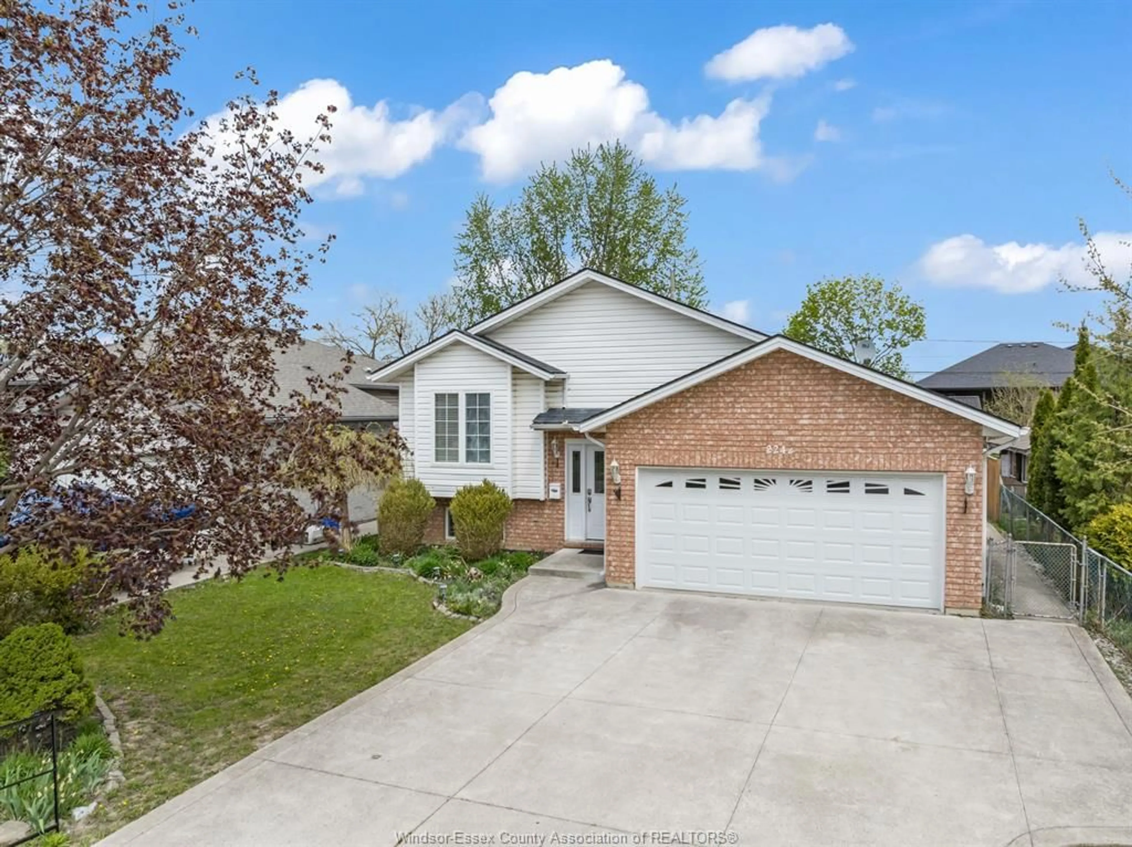 Home with vinyl exterior material, street for 2242 LONGFELLOW Ave, Windsor Ontario N9B 3J8