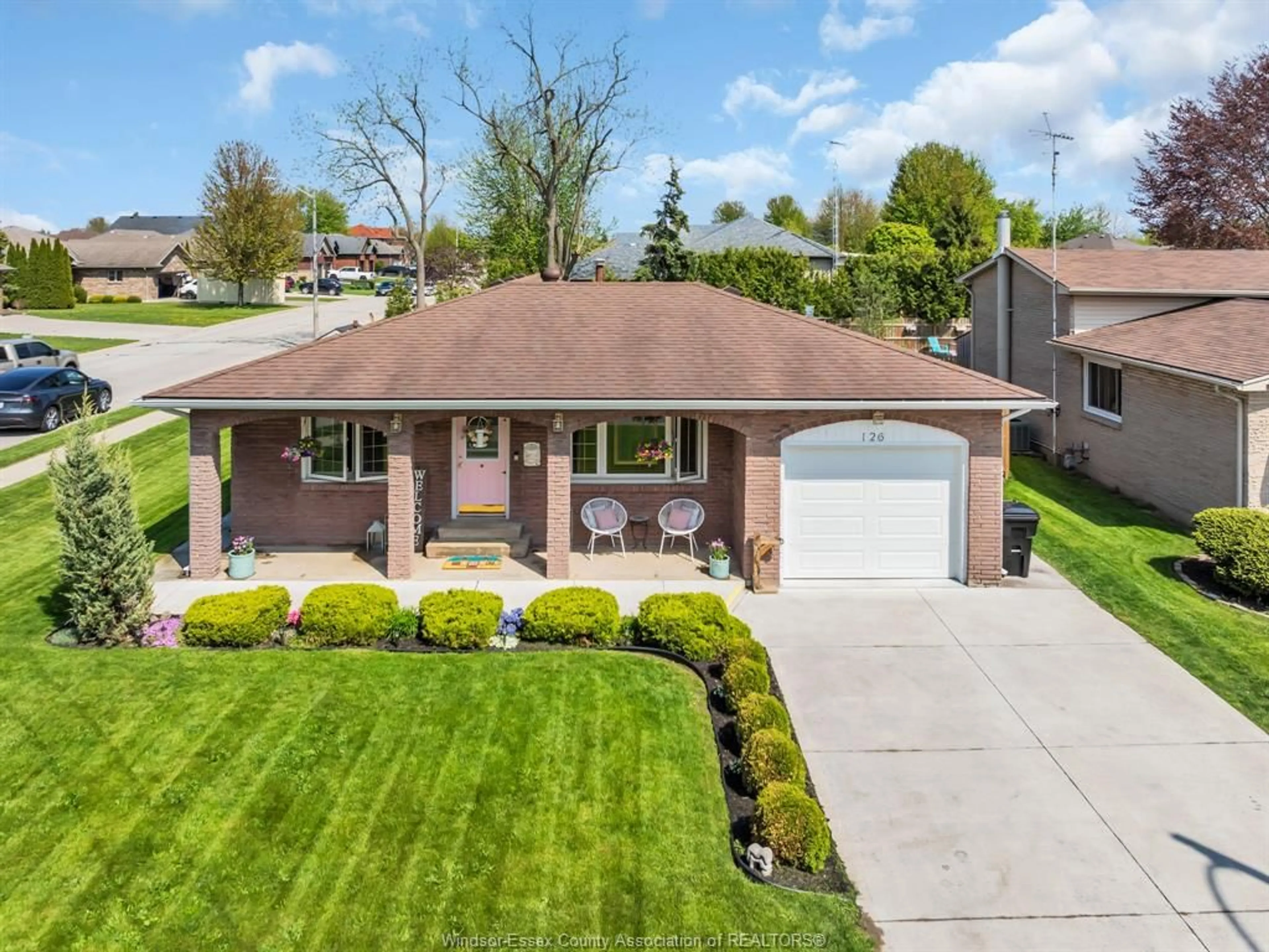 A pic from outside/outdoor area/front of a property/back of a property/a pic from drone, street for 126 MCCALLUM Dr, Kingsville Ontario N9Y 1G7
