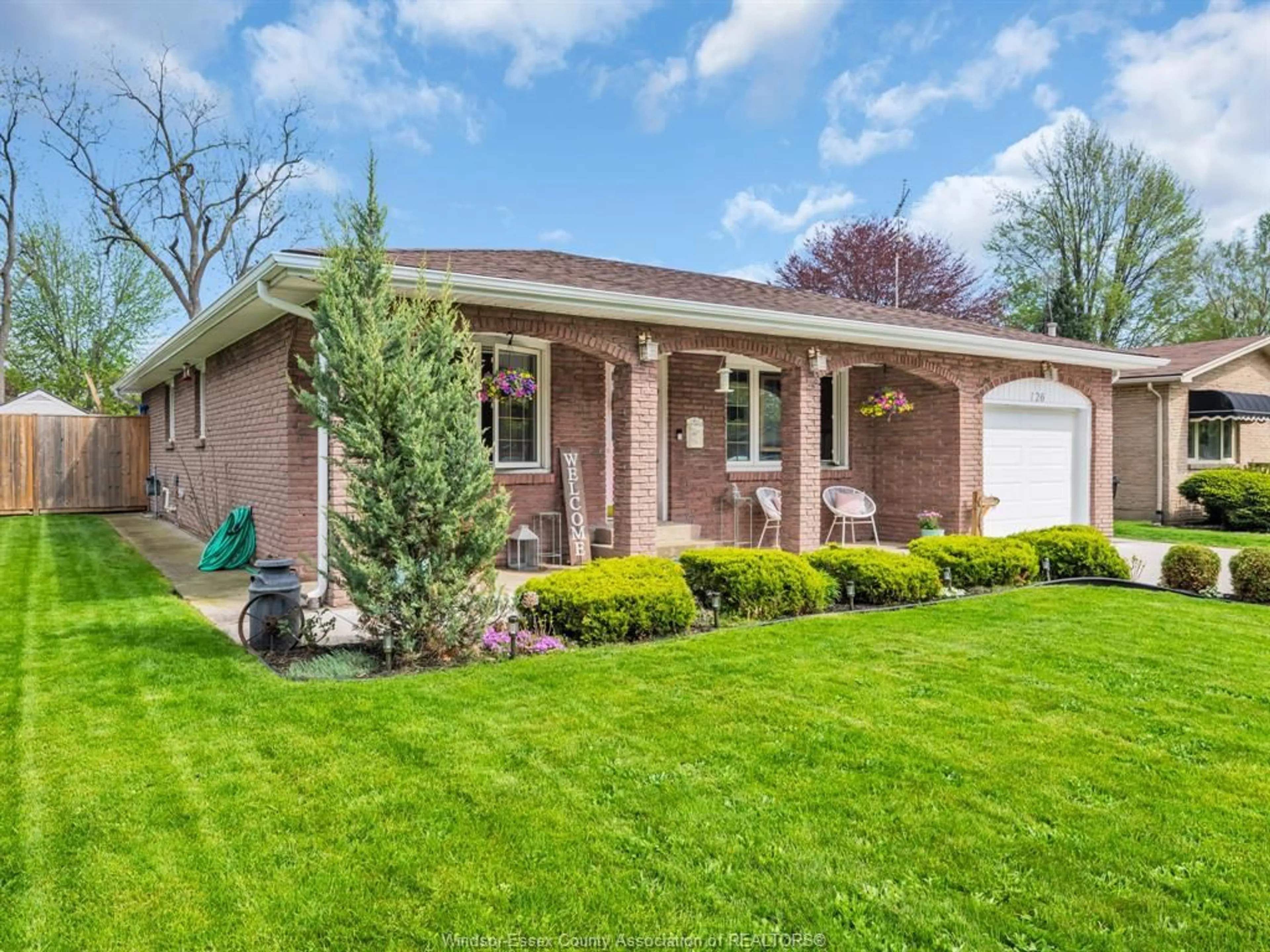 Home with brick exterior material, street for 126 MCCALLUM Dr, Kingsville Ontario N9Y 1G7