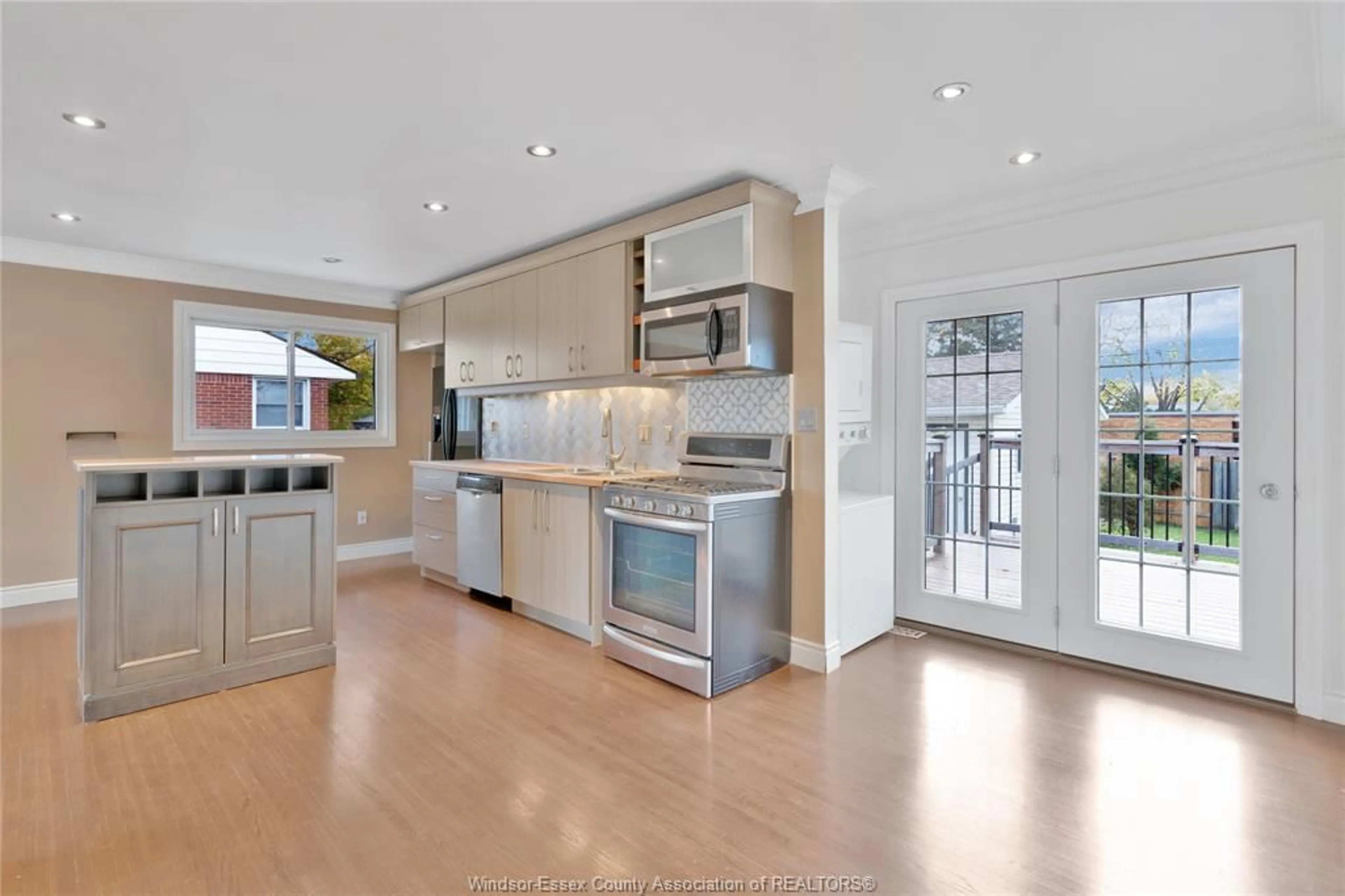 Open concept kitchen, ceramic/tile floor for 3633 McKay Ave, Windsor Ontario N9E 2S3