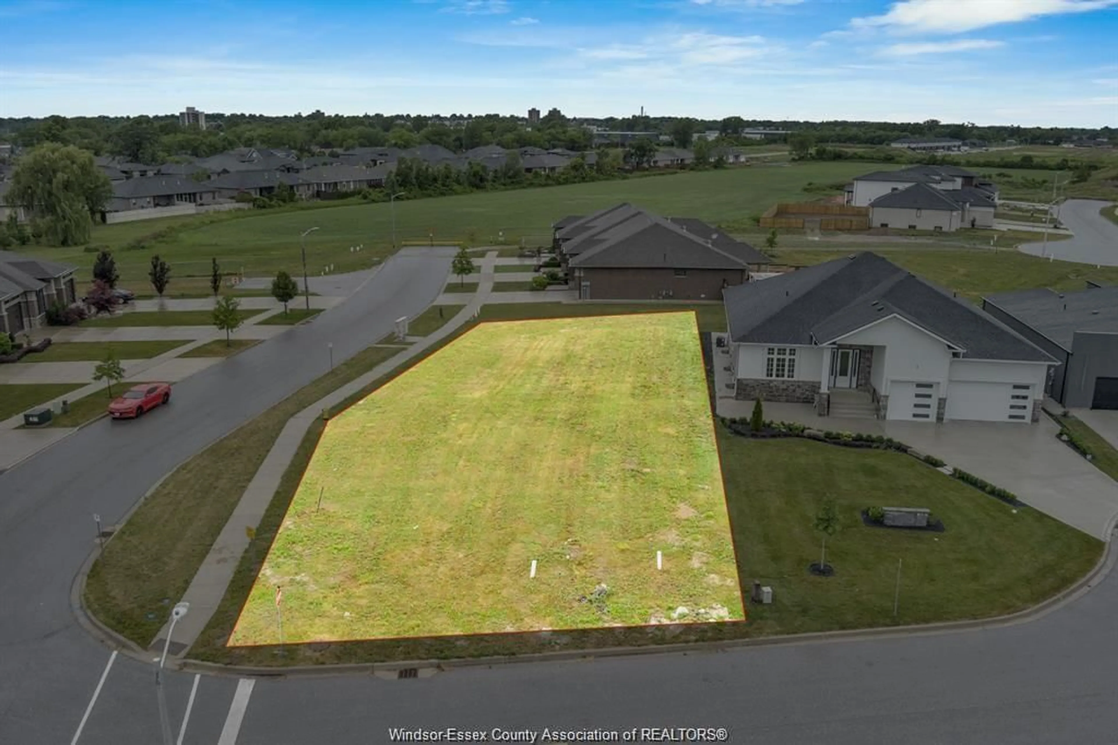 A pic from outside/outdoor area/front of a property/back of a property/a pic from drone, water/lake/river/ocean view for 1 ST. ANDREWS Crt, Leamington Ontario N8H 0C8