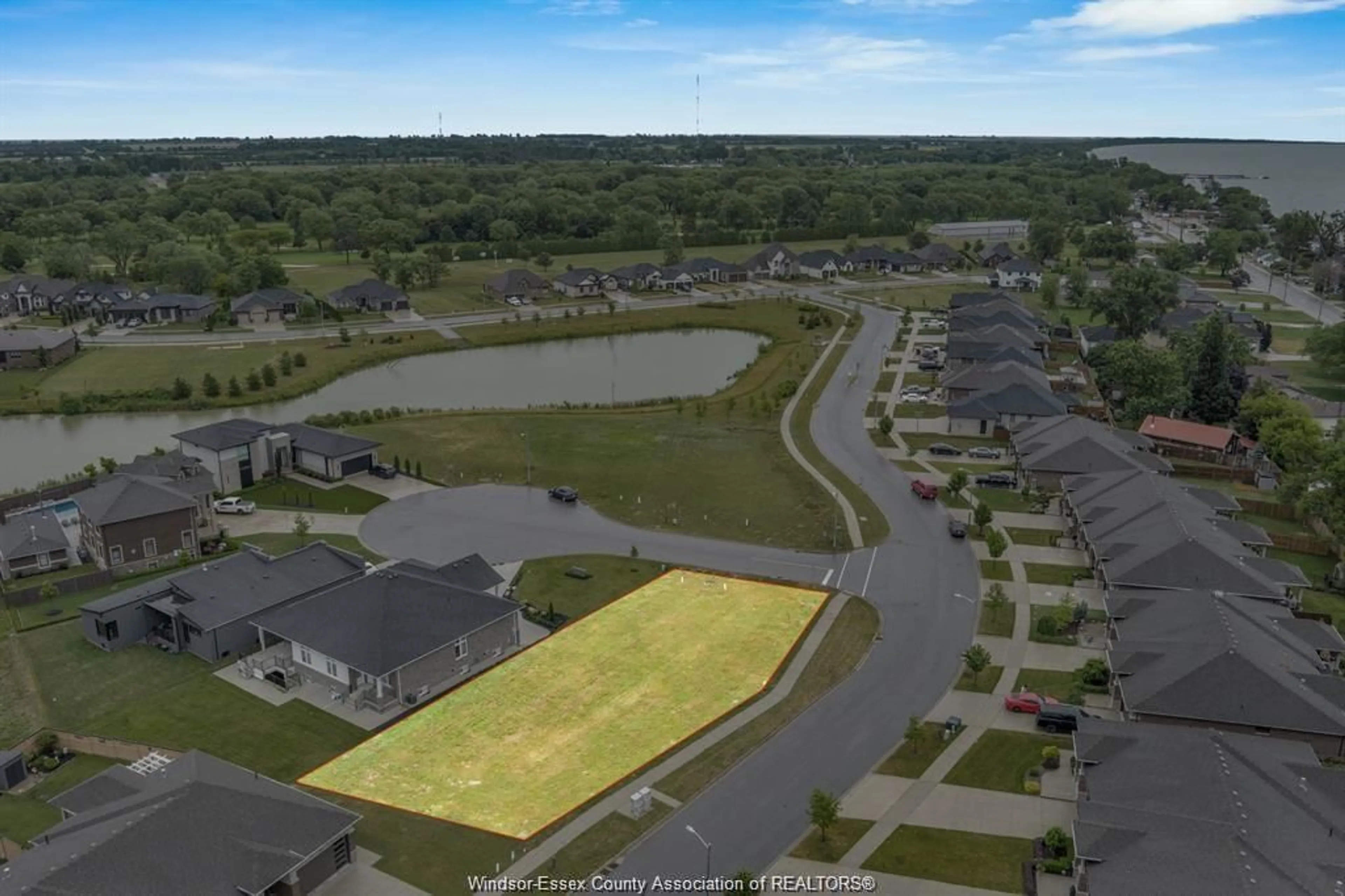 A pic from outside/outdoor area/front of a property/back of a property/a pic from drone, water/lake/river/ocean view for 1 ST. ANDREWS Crt, Leamington Ontario N8H 0C8