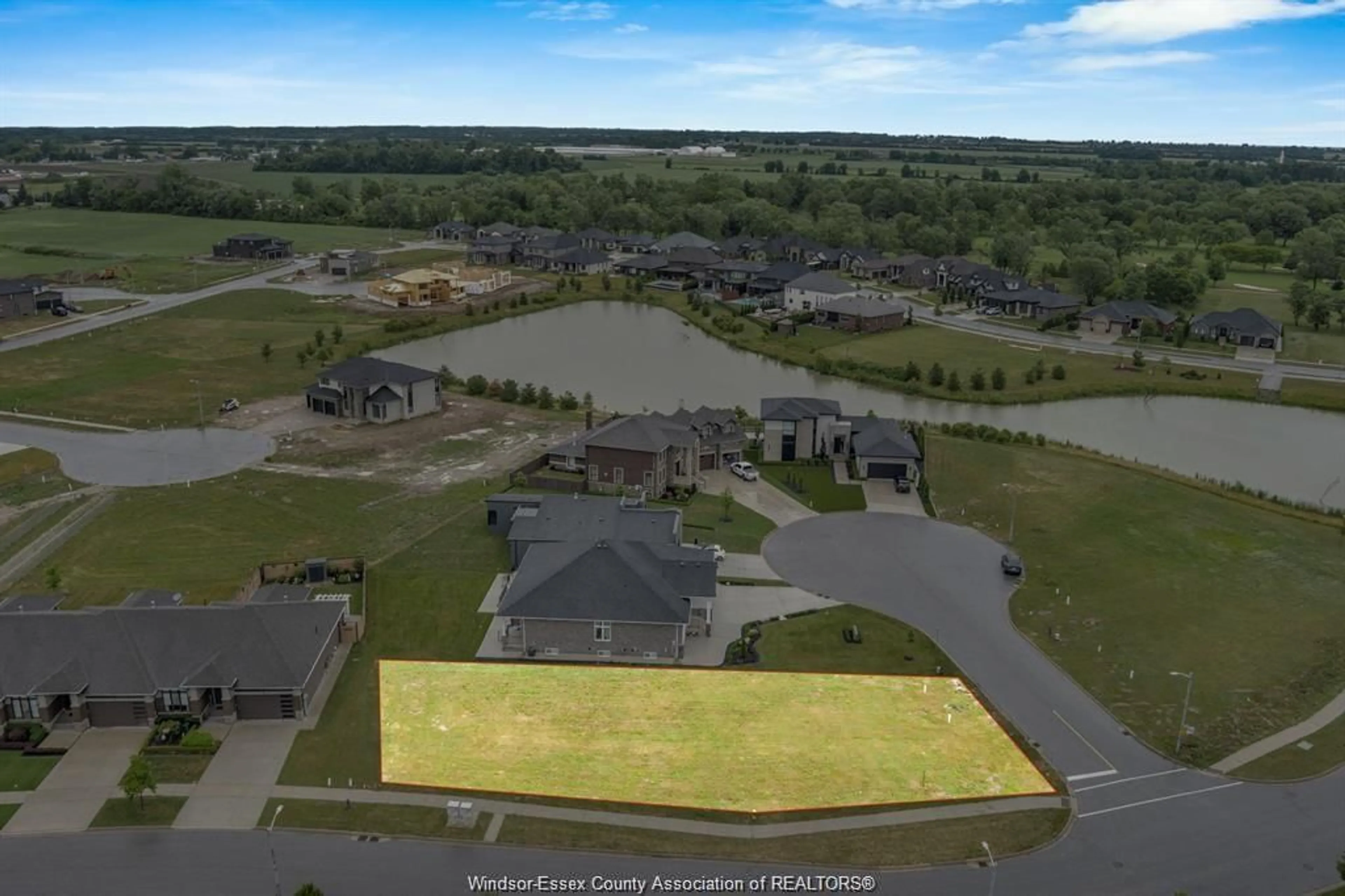 A pic from outside/outdoor area/front of a property/back of a property/a pic from drone, water/lake/river/ocean view for 1 ST. ANDREWS Crt, Leamington Ontario N8H 0C8