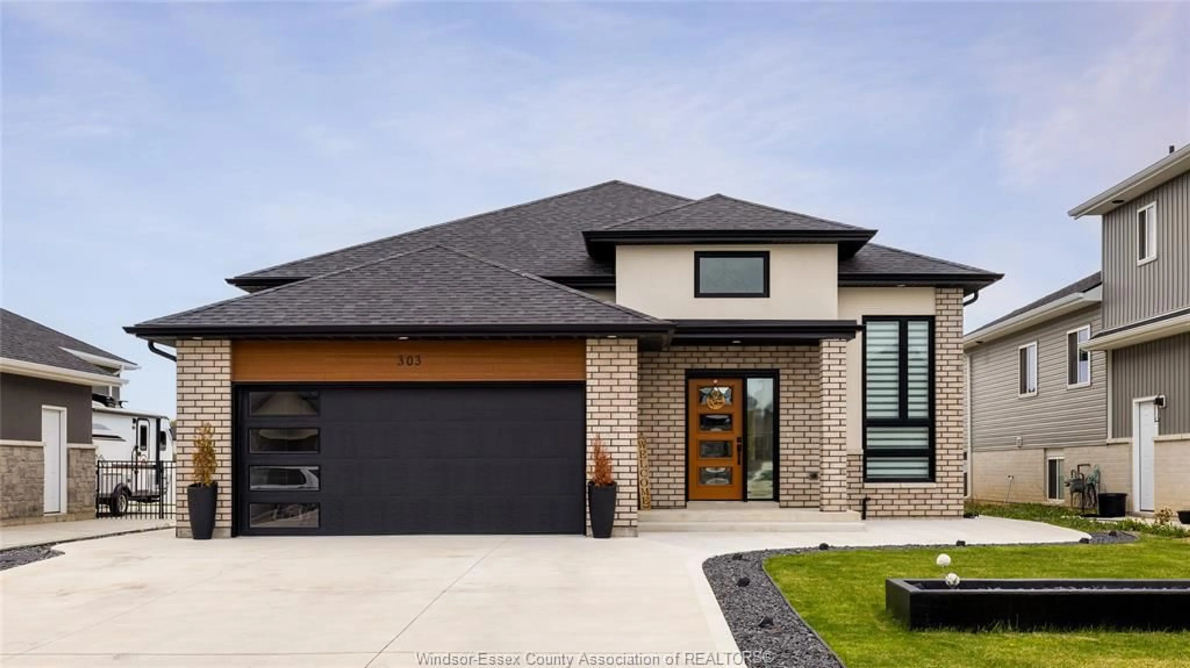 Home with brick exterior material, street for 303 Morin Rd, Amherstburg Ontario N9G 0V8