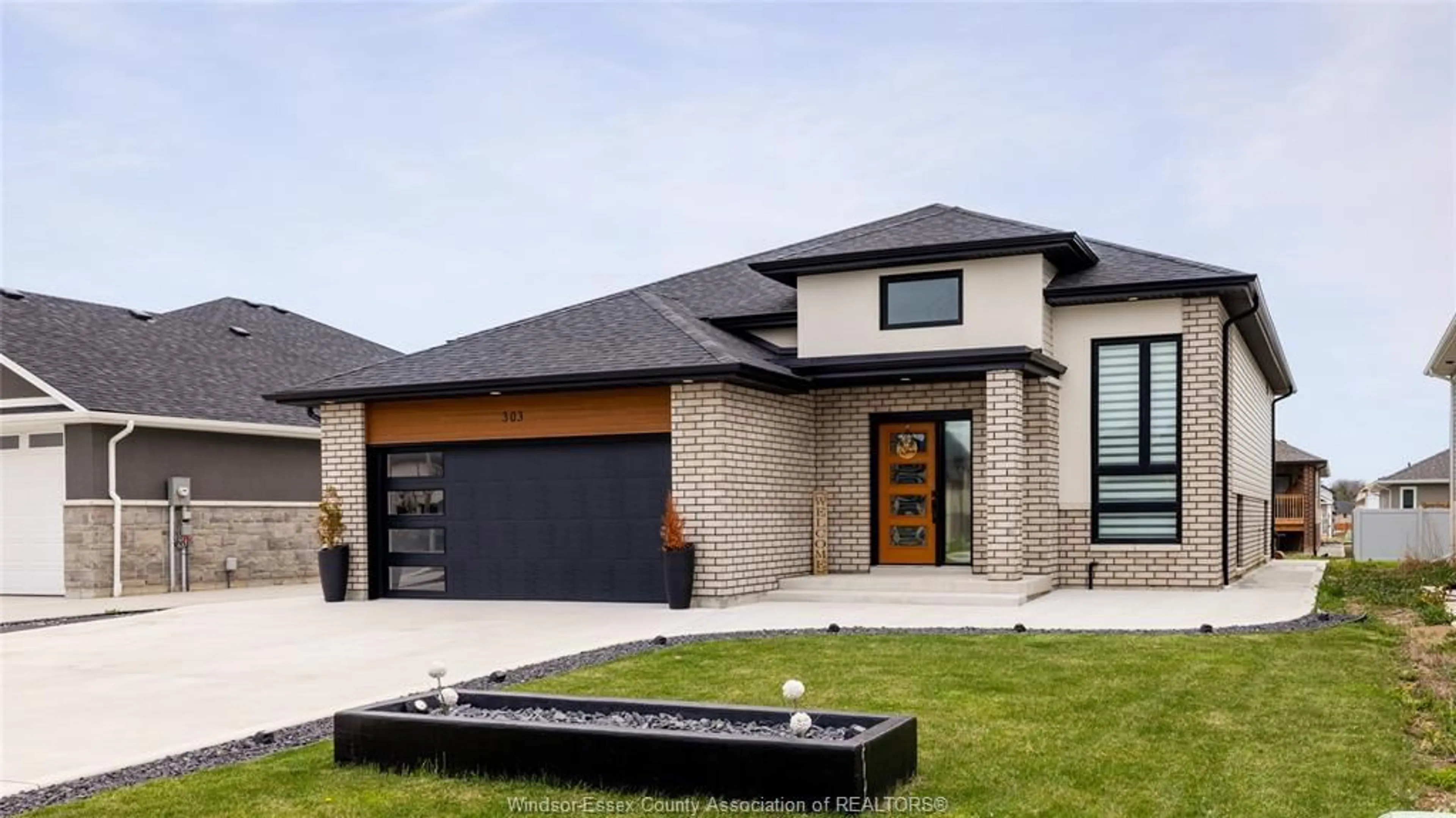 Home with brick exterior material, street for 303 Morin Rd, Amherstburg Ontario N9G 0V8