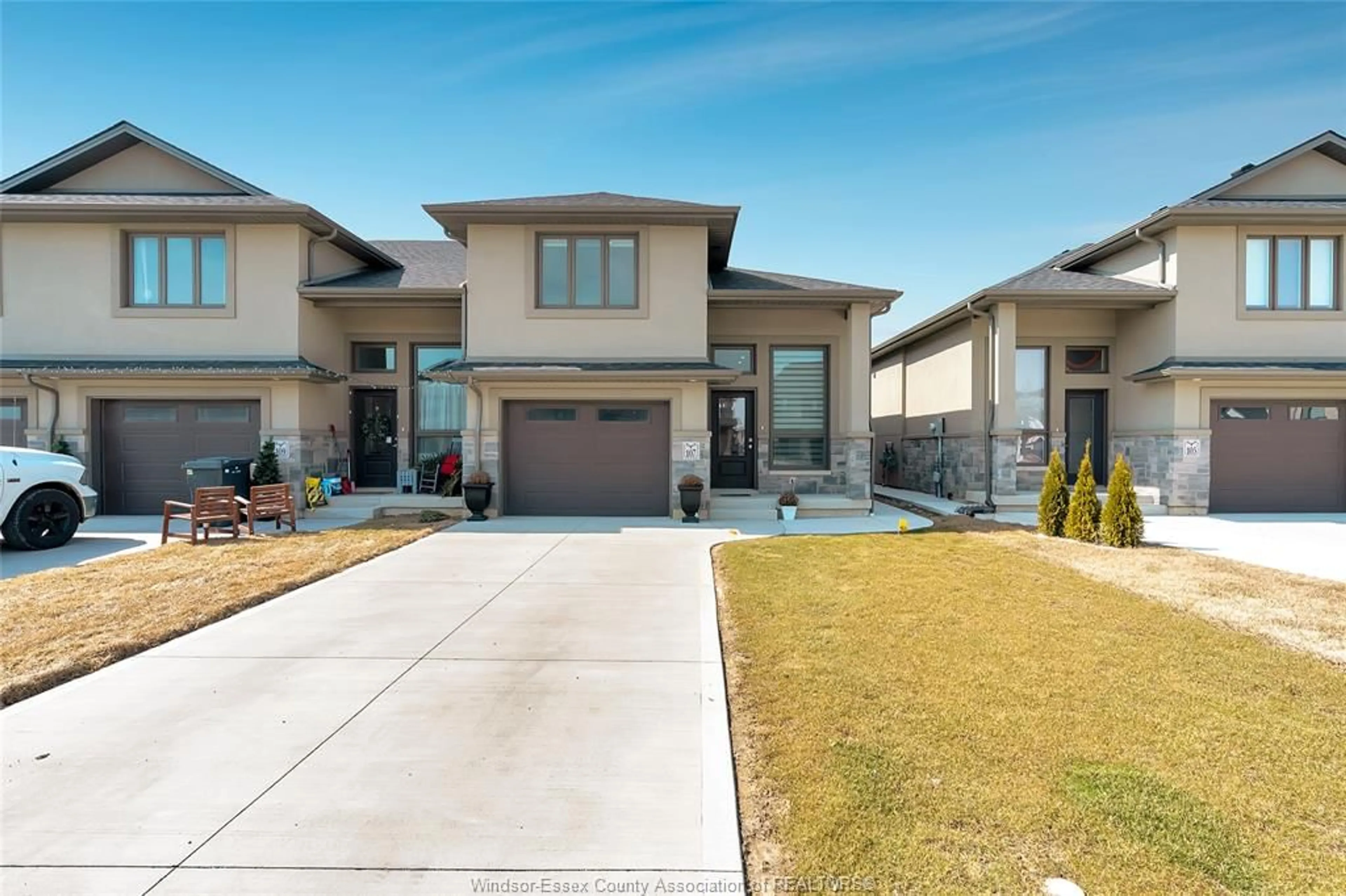 Home with brick exterior material, street for 107 PETERS St, Essex Ontario N8M 0B1