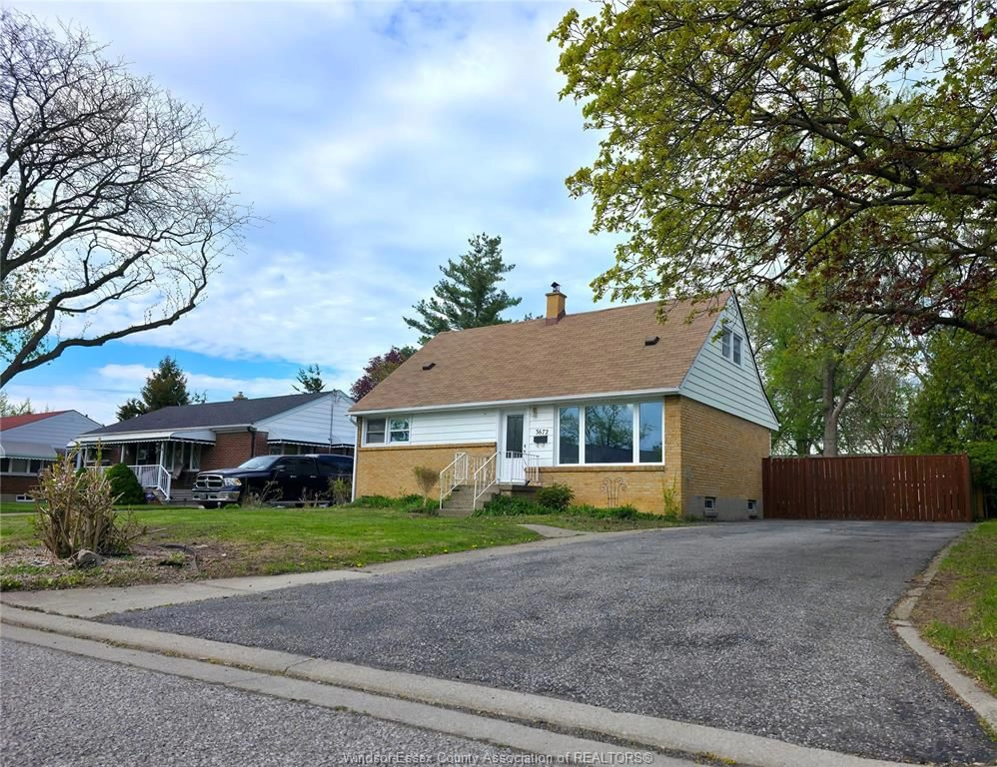 Home with vinyl exterior material, street for 3672 MORRIS Dr, Windsor Ontario N9E 2K7
