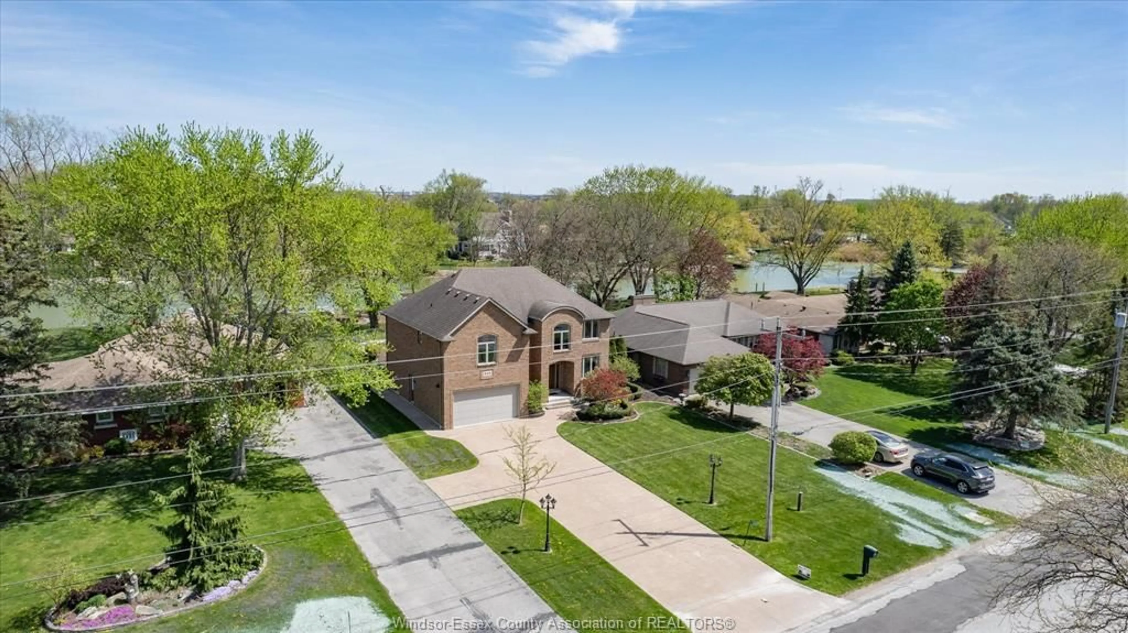 A pic from outside/outdoor area/front of a property/back of a property/a pic from drone, street for 242 WEST PUCE Rd, Lakeshore Ontario N0R 1A0