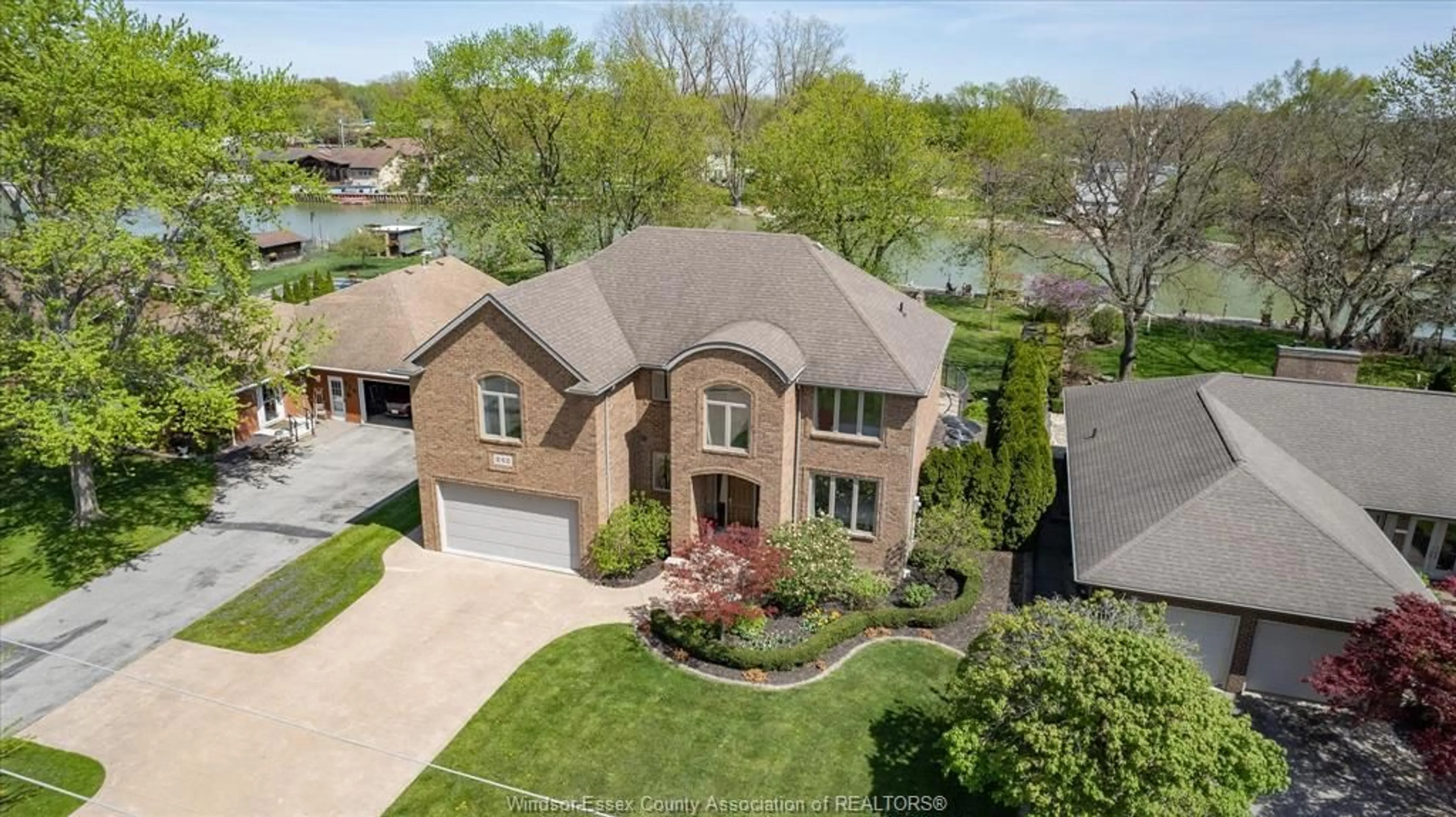 A pic from outside/outdoor area/front of a property/back of a property/a pic from drone, water/lake/river/ocean view for 242 WEST PUCE Rd, Lakeshore Ontario N0R 1A0