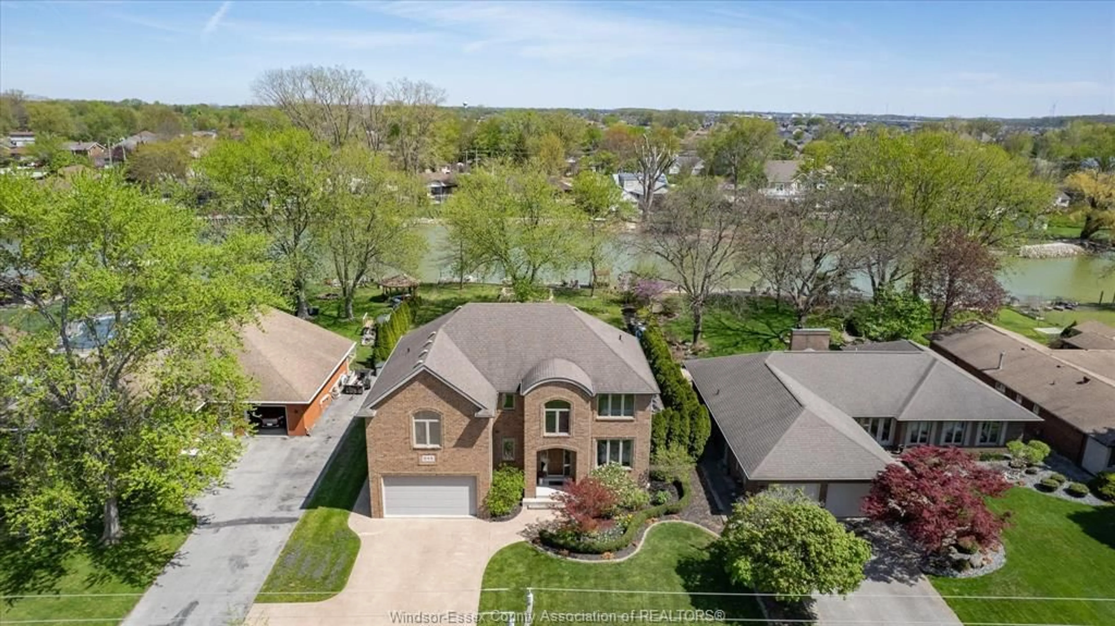 A pic from outside/outdoor area/front of a property/back of a property/a pic from drone, water/lake/river/ocean view for 242 WEST PUCE Rd, Lakeshore Ontario N0R 1A0