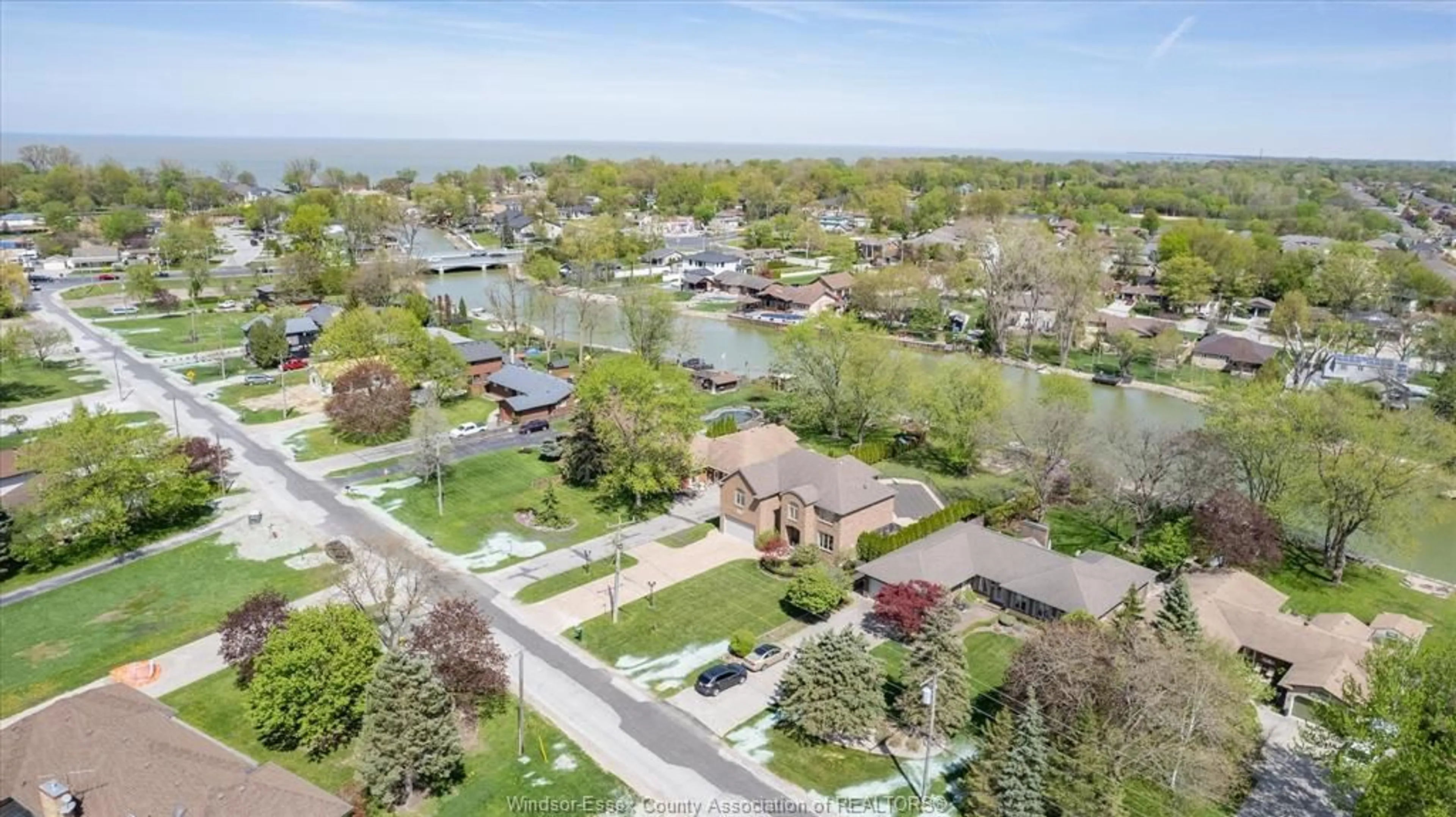 A pic from outside/outdoor area/front of a property/back of a property/a pic from drone, water/lake/river/ocean view for 242 WEST PUCE Rd, Lakeshore Ontario N0R 1A0