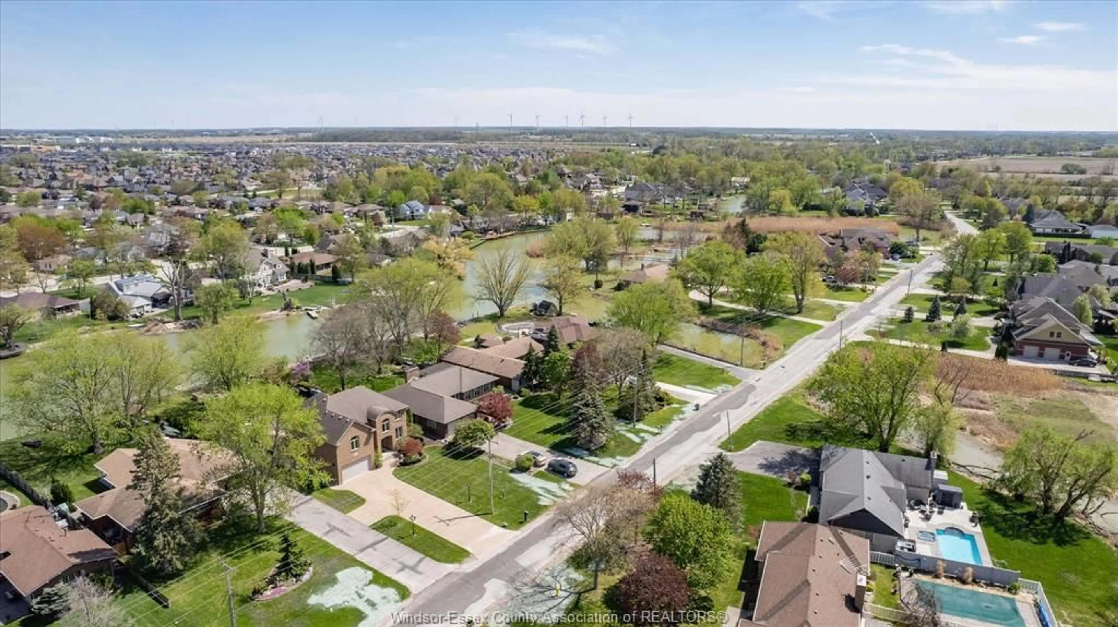 A pic from outside/outdoor area/front of a property/back of a property/a pic from drone, street for 242 WEST PUCE Rd, Lakeshore Ontario N0R 1A0