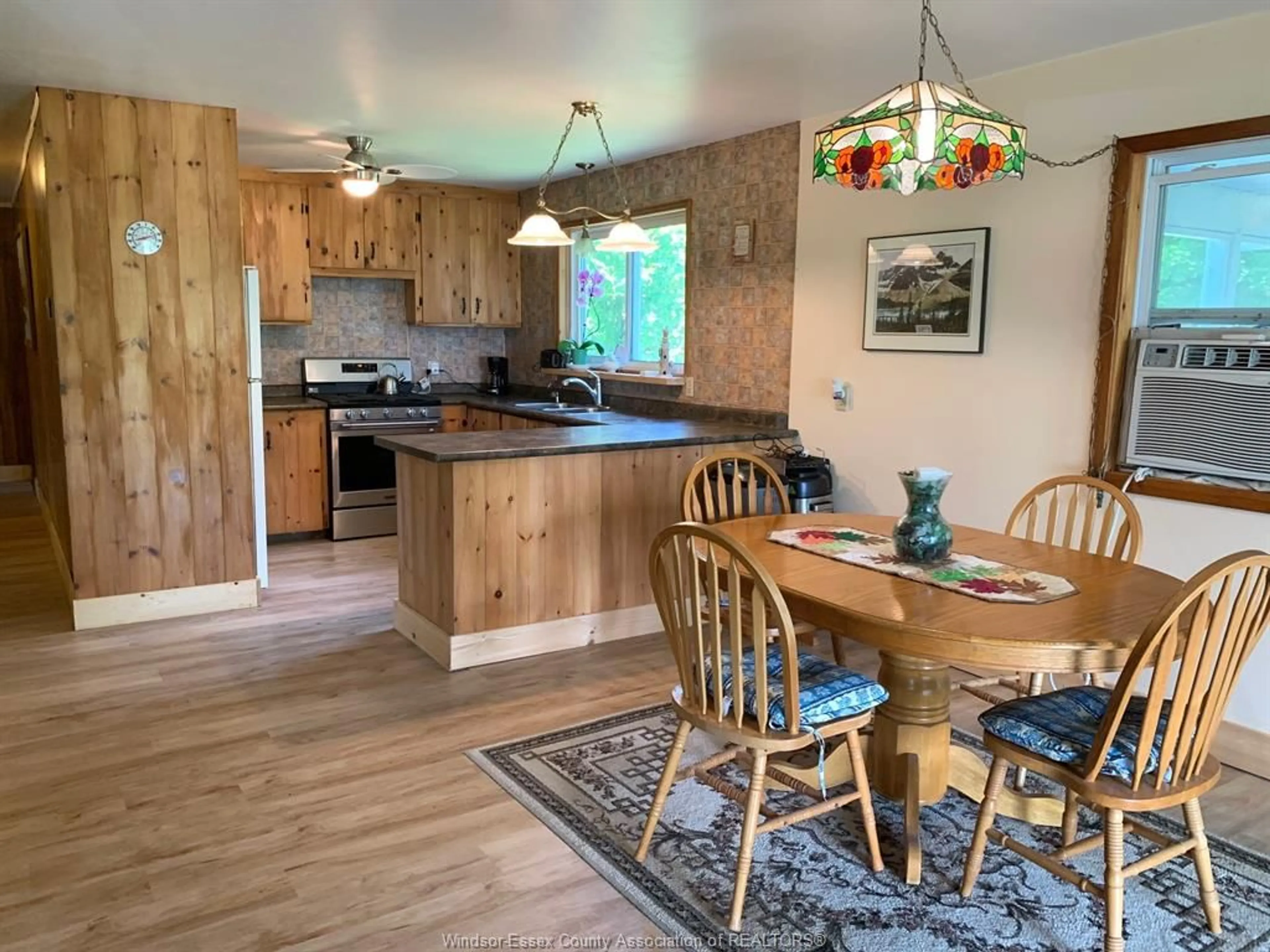 Open concept kitchen, wood/laminate floor for 473 SOUTH SHORE Rd, Pelee Island Ontario N0R 1M0