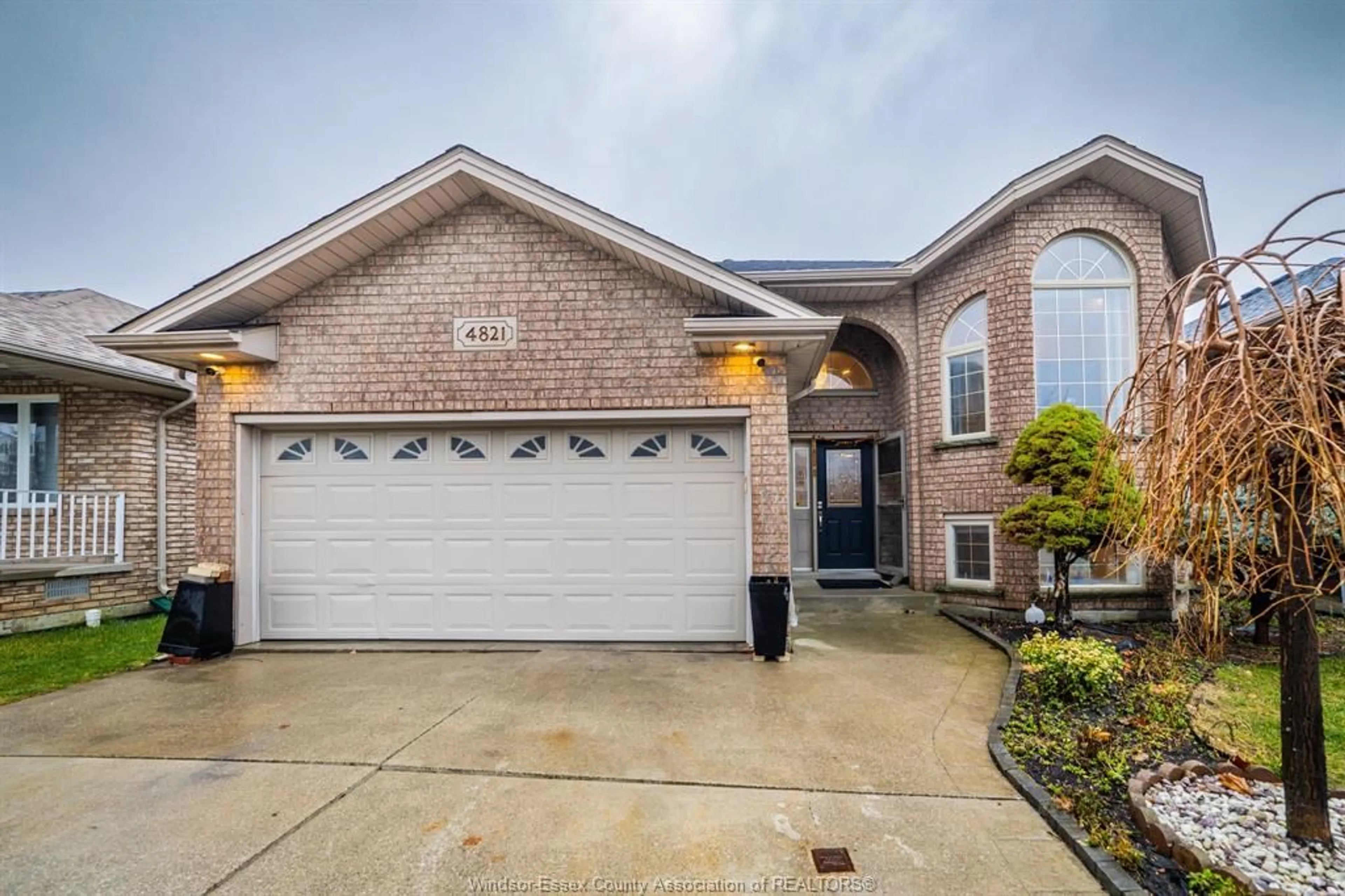 Home with brick exterior material, street for 4821 JULIET Cres, Windsor Ontario N9G 3A6