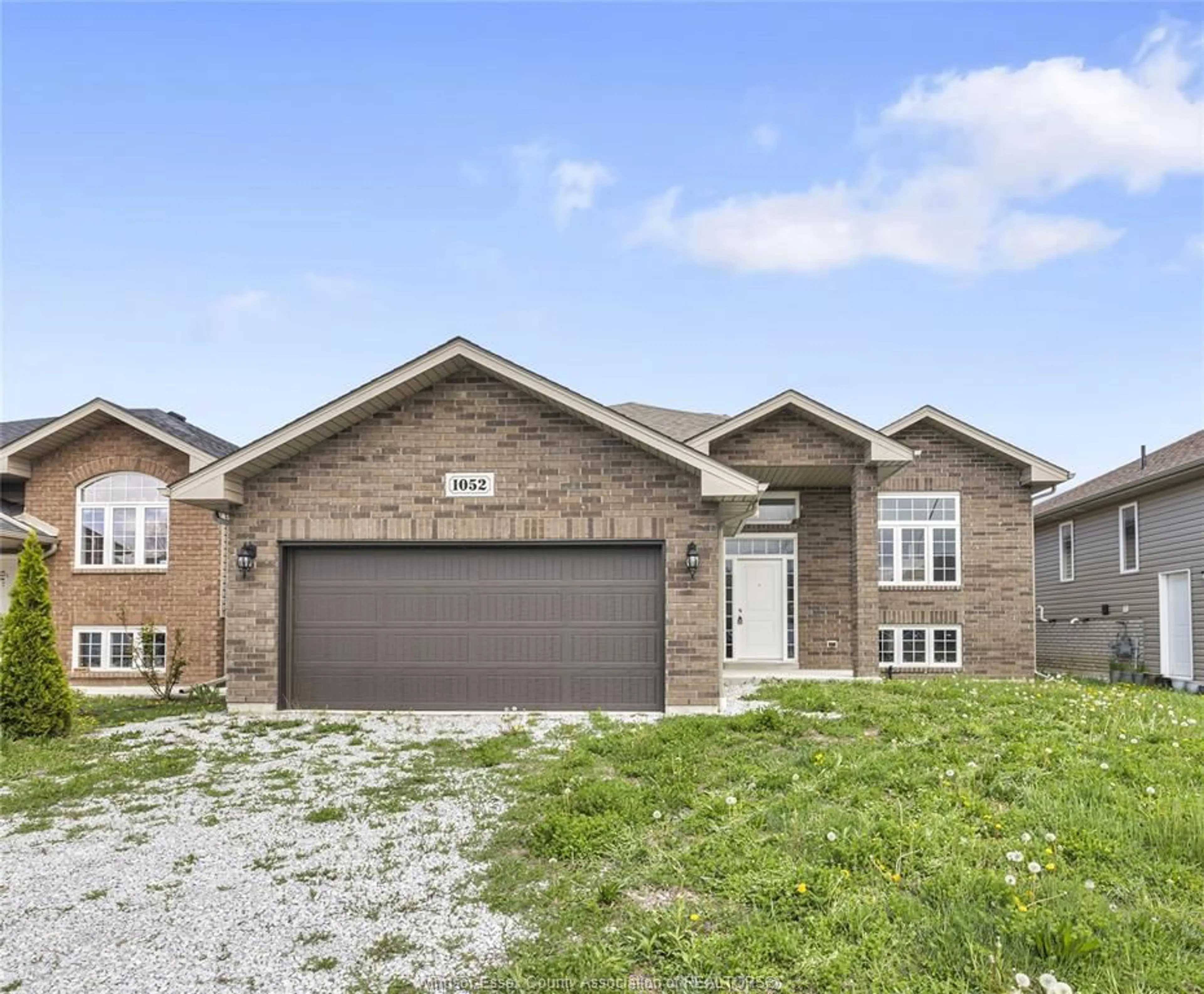 Home with brick exterior material, street for 1052 LUBLIN Ave, Windsor Ontario N8P 035