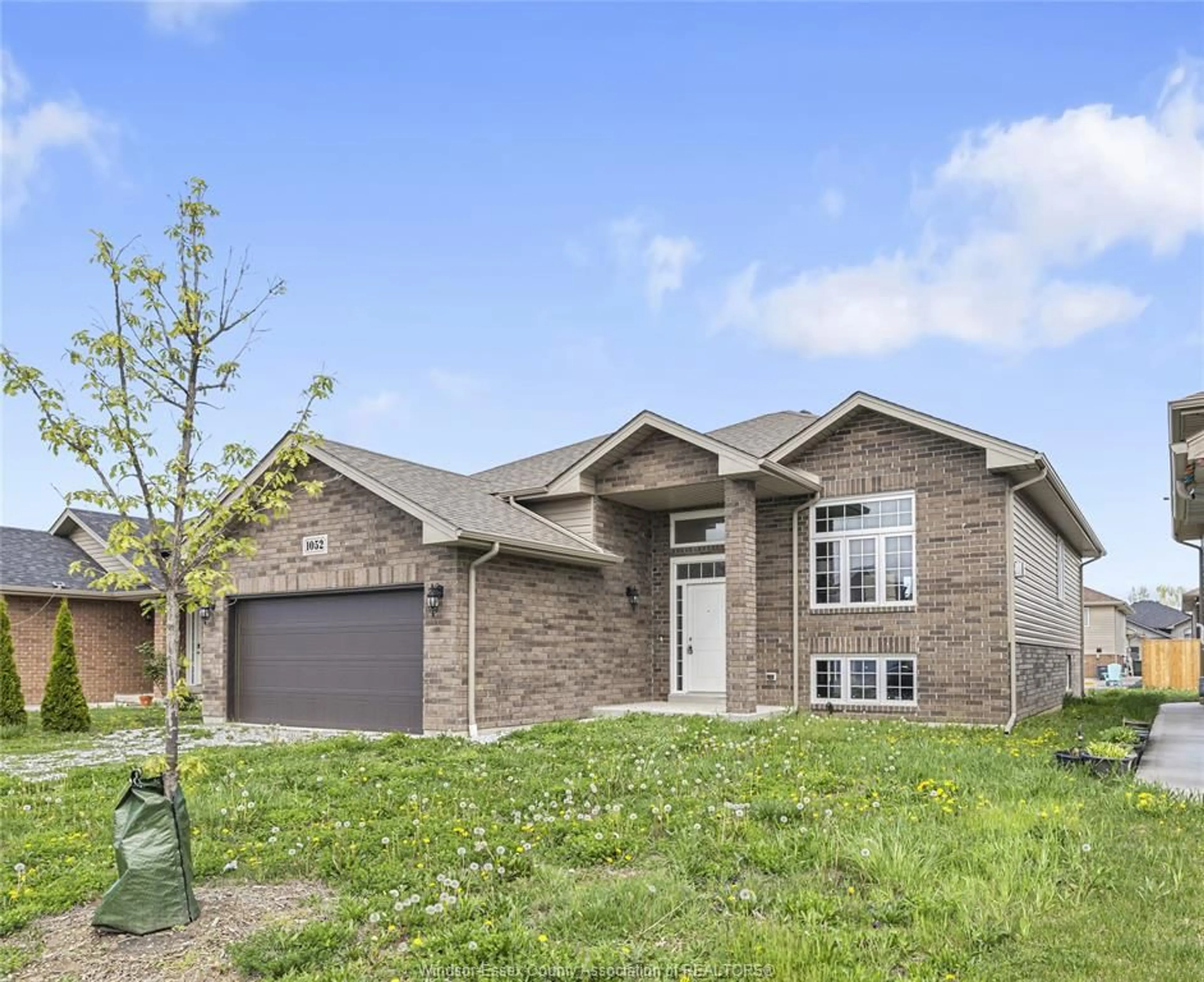 Home with brick exterior material, street for 1052 LUBLIN Ave, Windsor Ontario N8P 035
