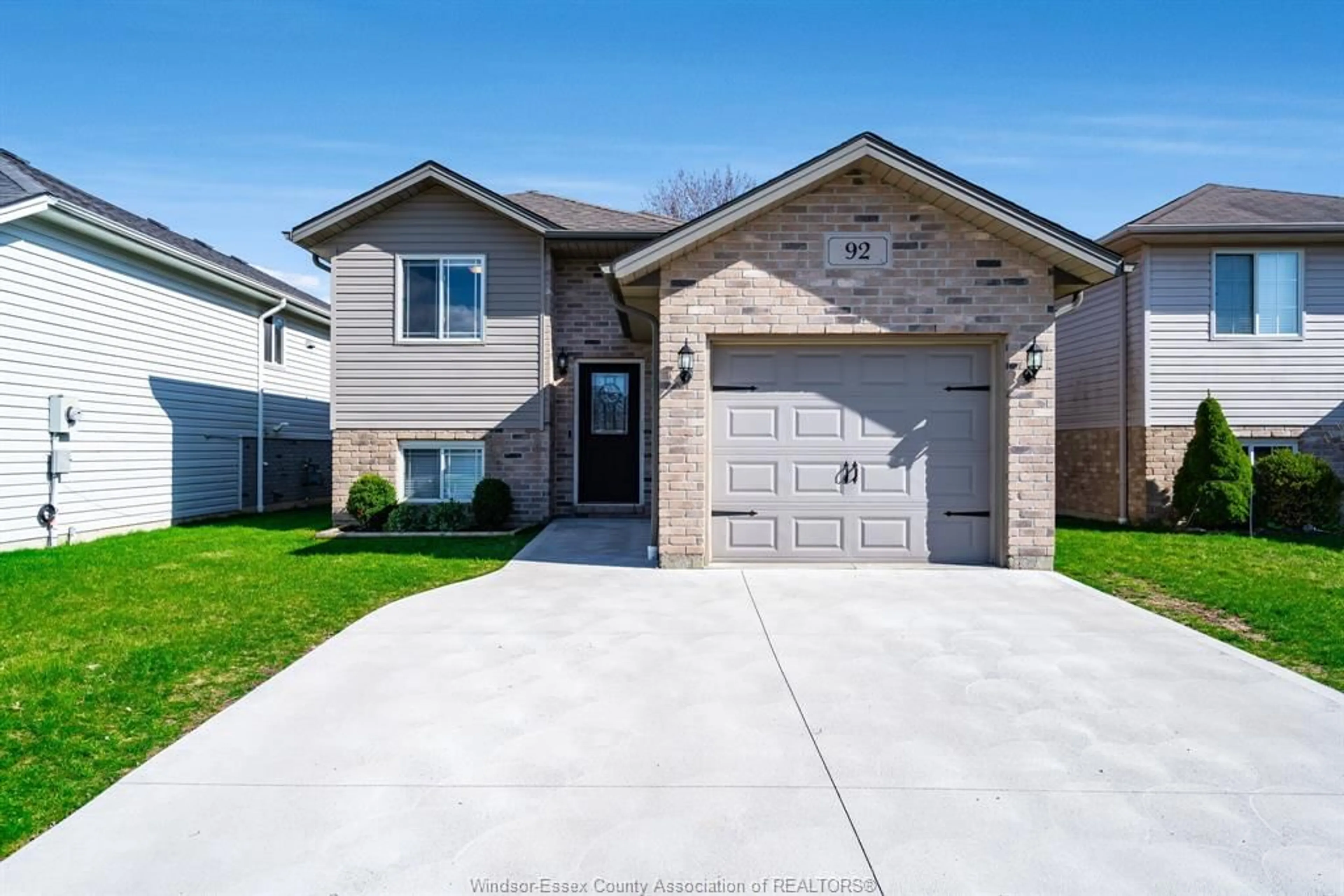 Home with brick exterior material, street for 92 Manning Dr, Chatham Ontario N7M 0A6