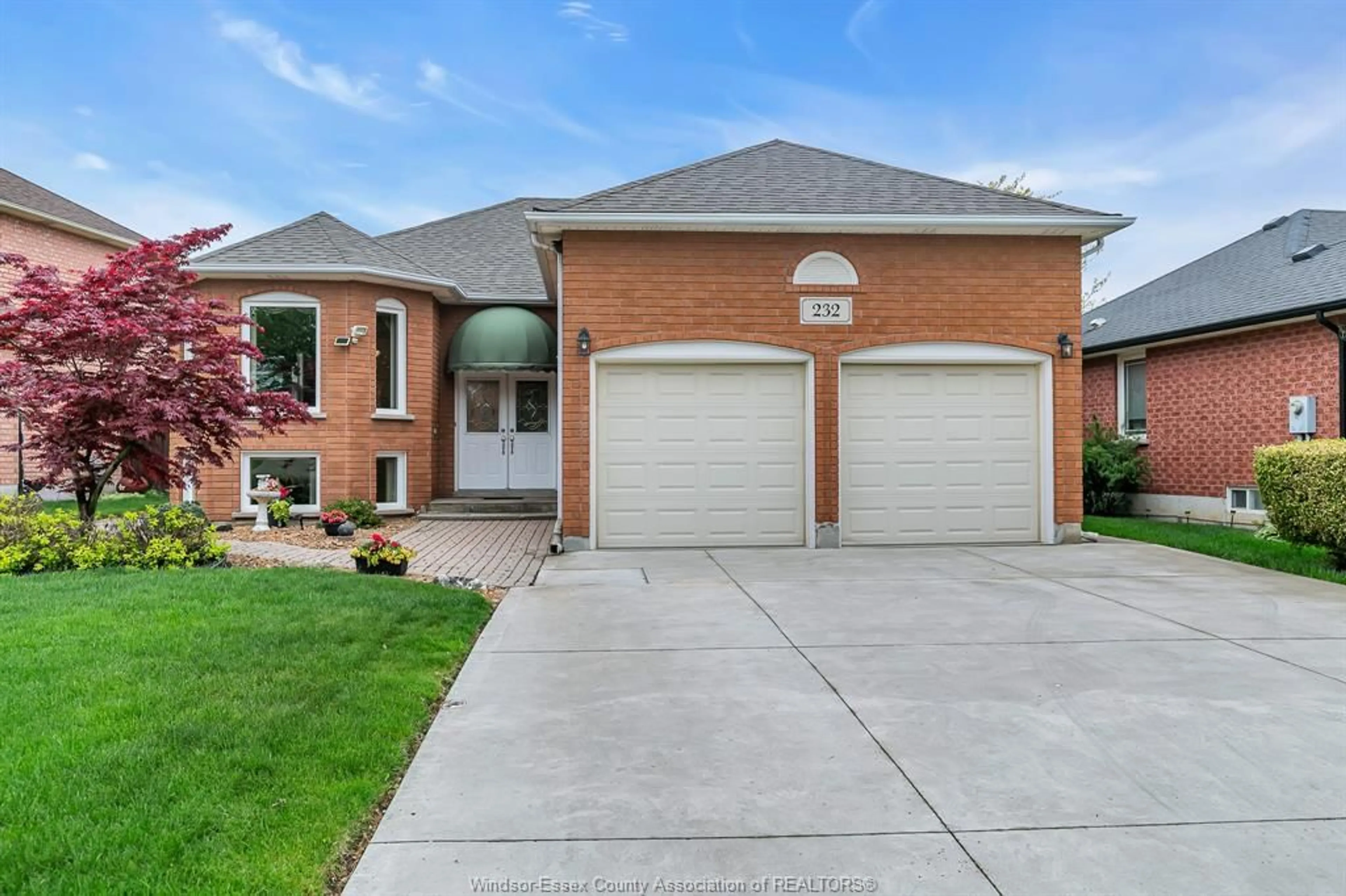 Home with brick exterior material, street for 232 EVELEIGH Cres, Windsor Ontario N9E 4M3