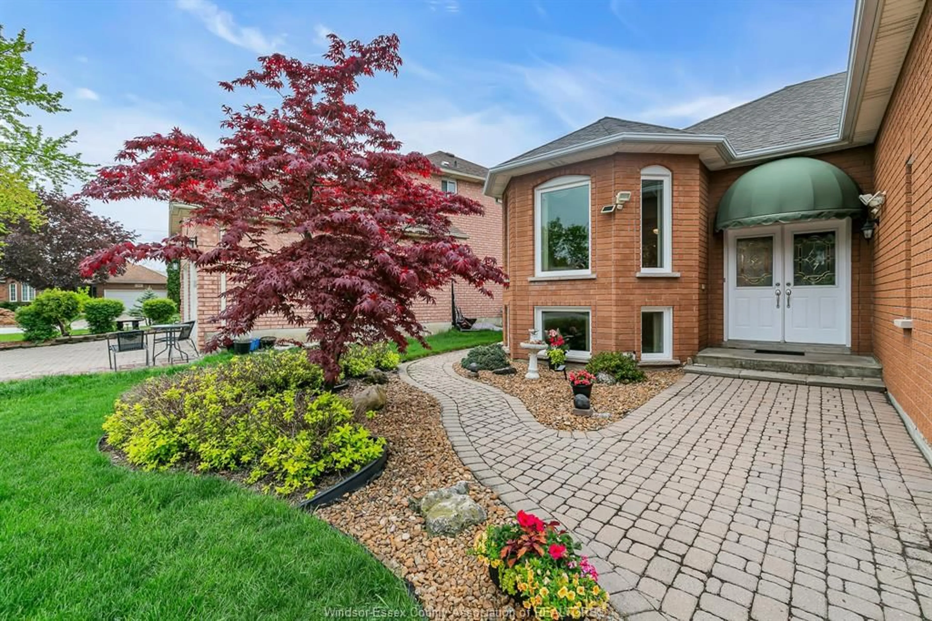 Home with brick exterior material, street for 232 EVELEIGH Cres, Windsor Ontario N9E 4M3