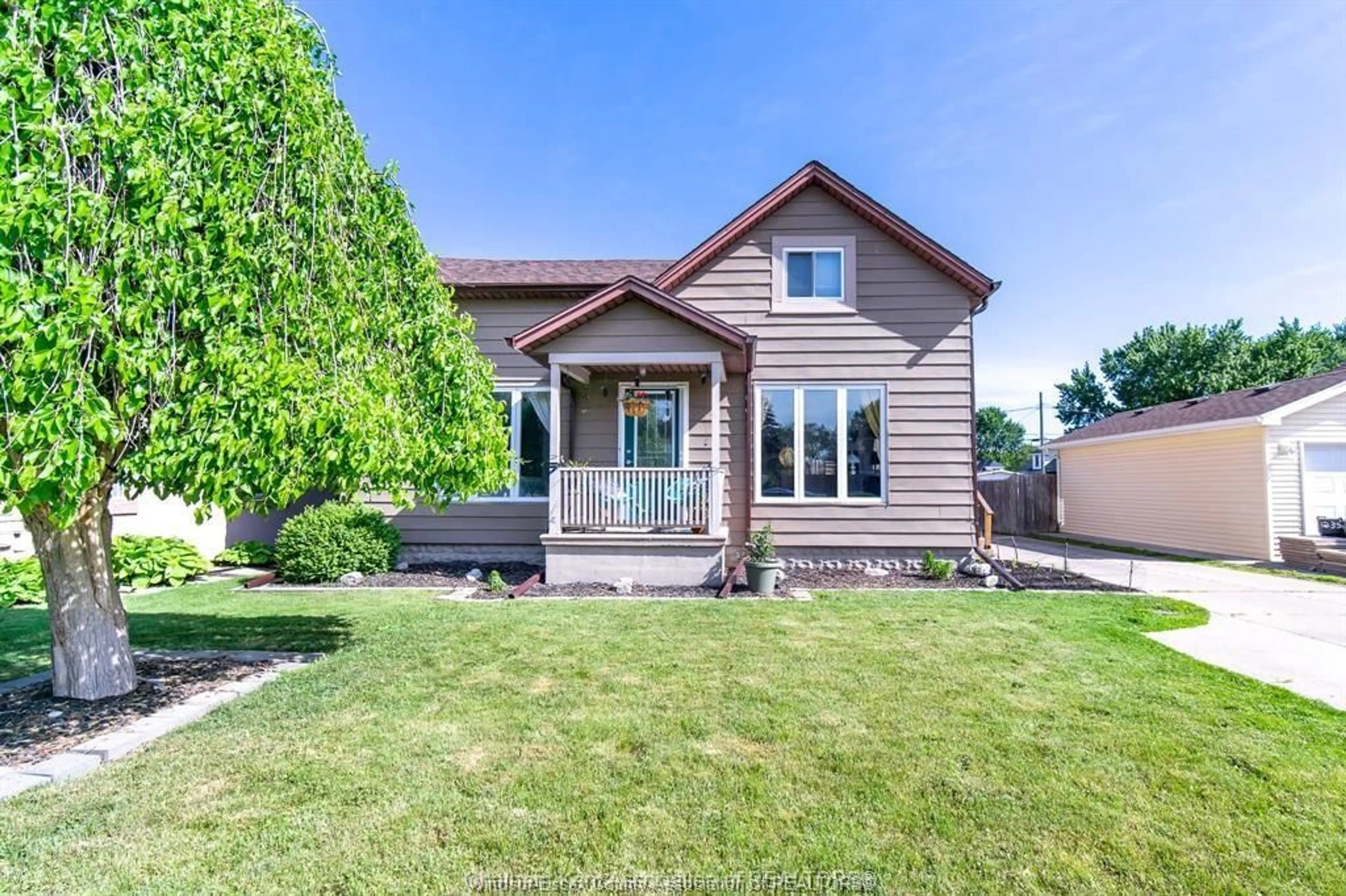 Home with brick exterior material, street for 12346-48 ARBOUR St, Tecumseh Ontario N8N 1P2