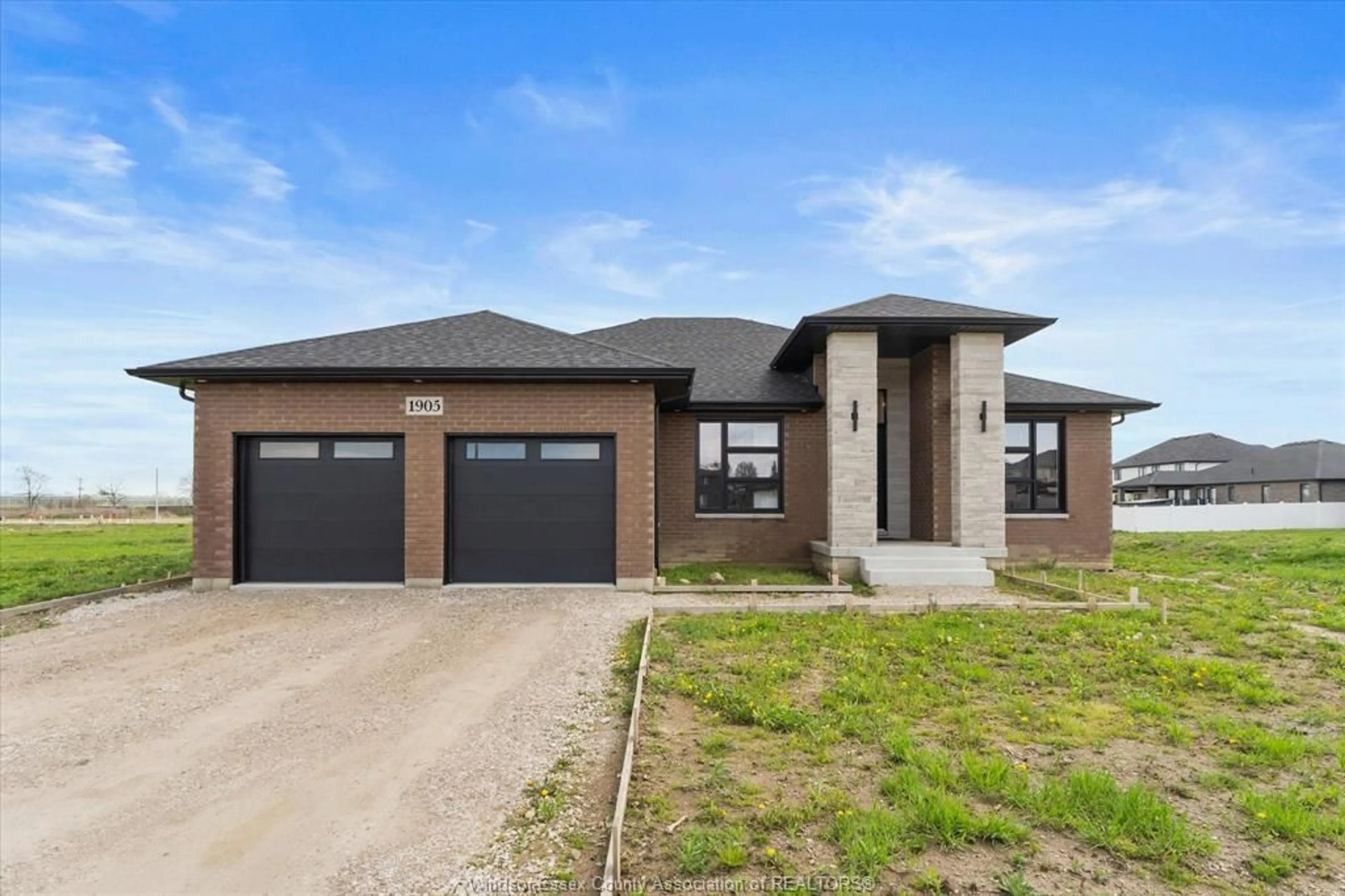 Home with brick exterior material, street for 1905 SANNITA, Kingsville Ontario N9Y 0G6