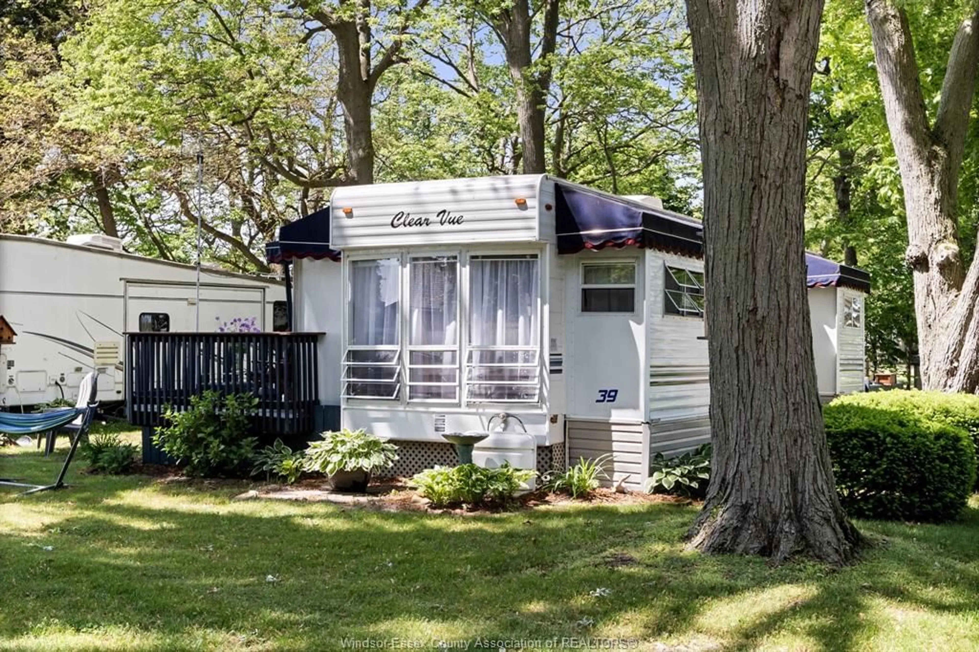 Home with vinyl exterior material, street for 445 COUNTY RD 50 #LOT 39, Colchester Ontario N0R 1G0