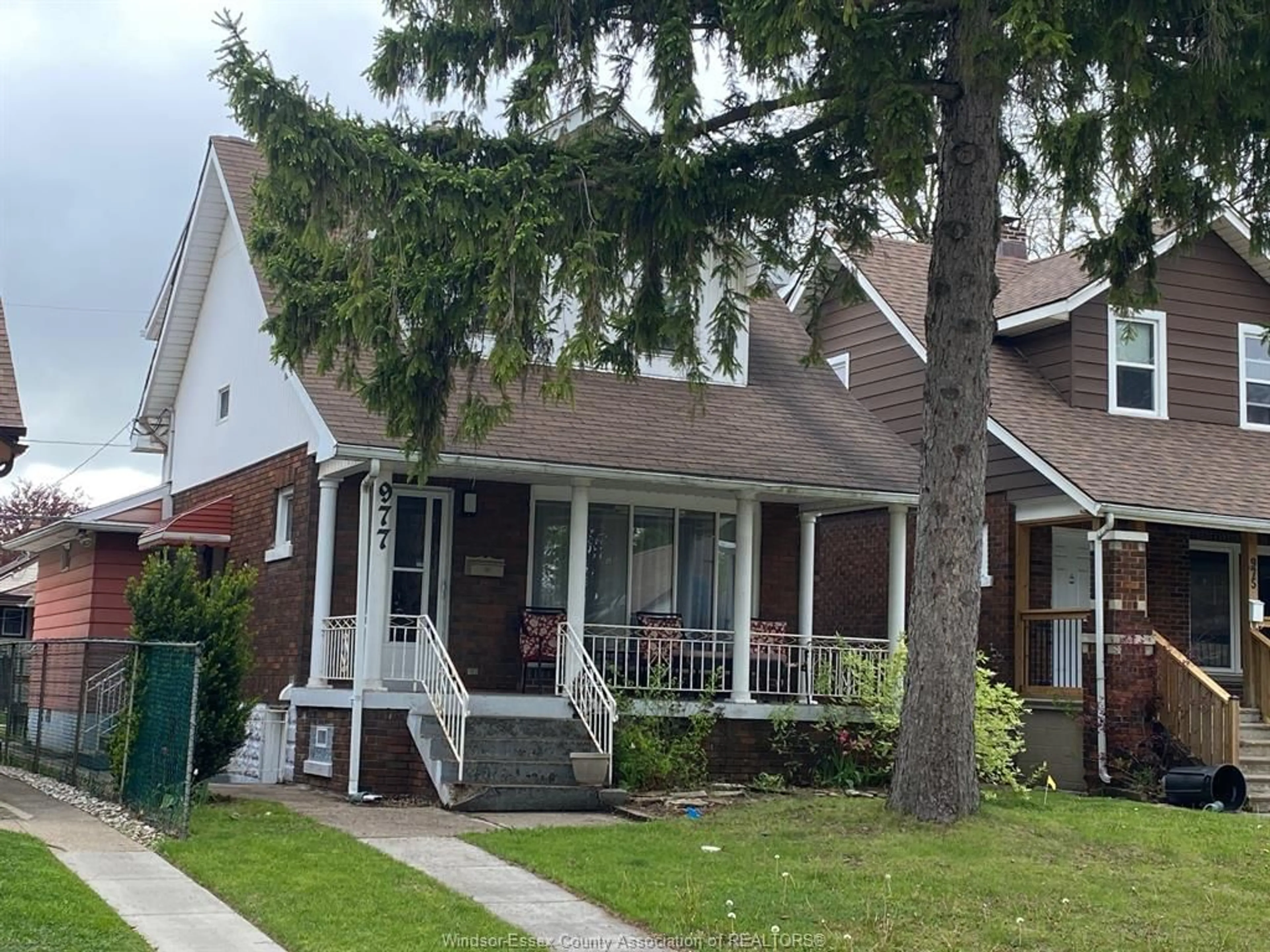 Home with brick exterior material, street for 977 CURRY Ave, Windsor Ontario N9B 2C4
