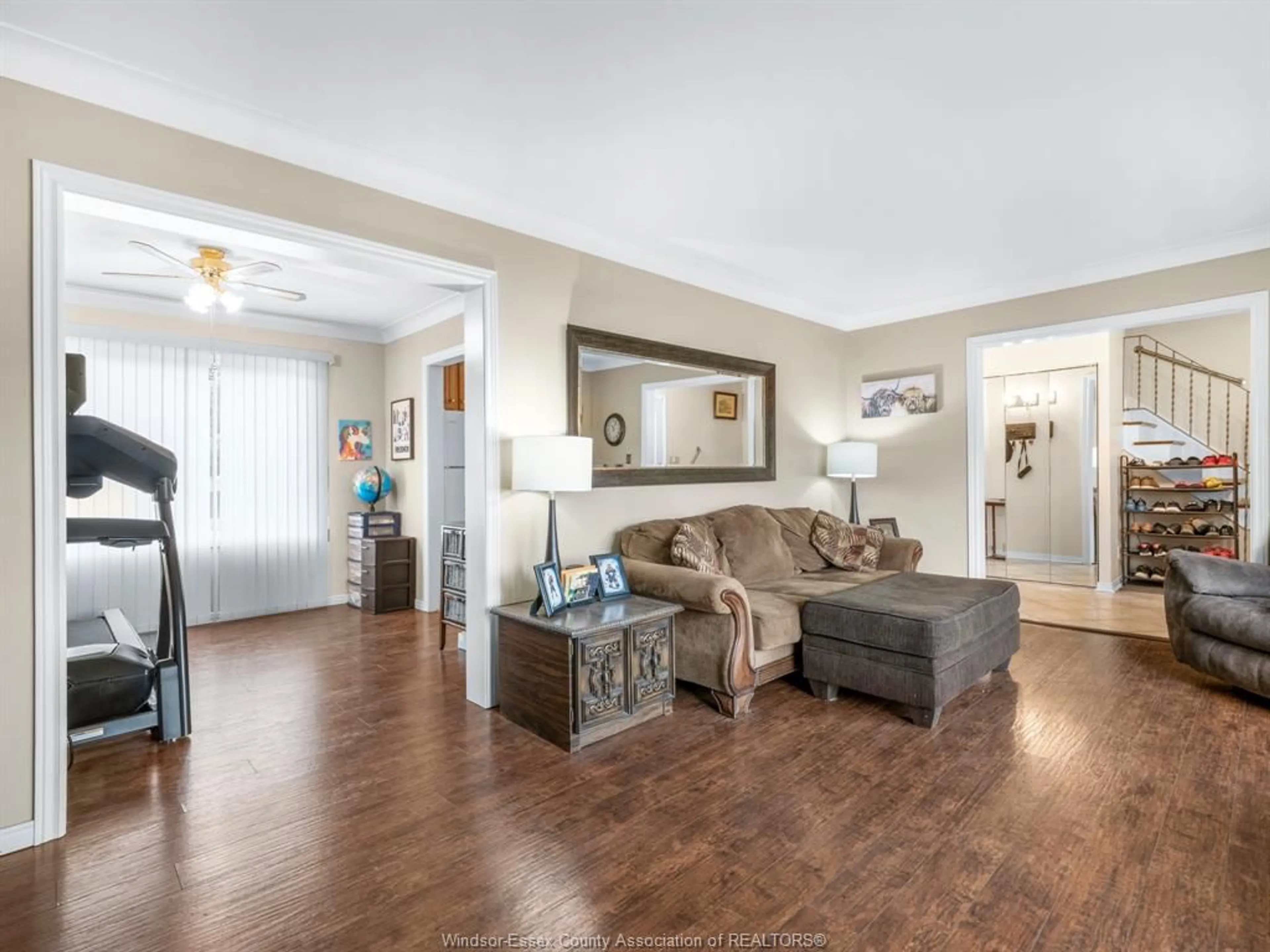 Living room with furniture, wood/laminate floor for 2815 SKYLINE Dr, Windsor Ontario N9E 3A6