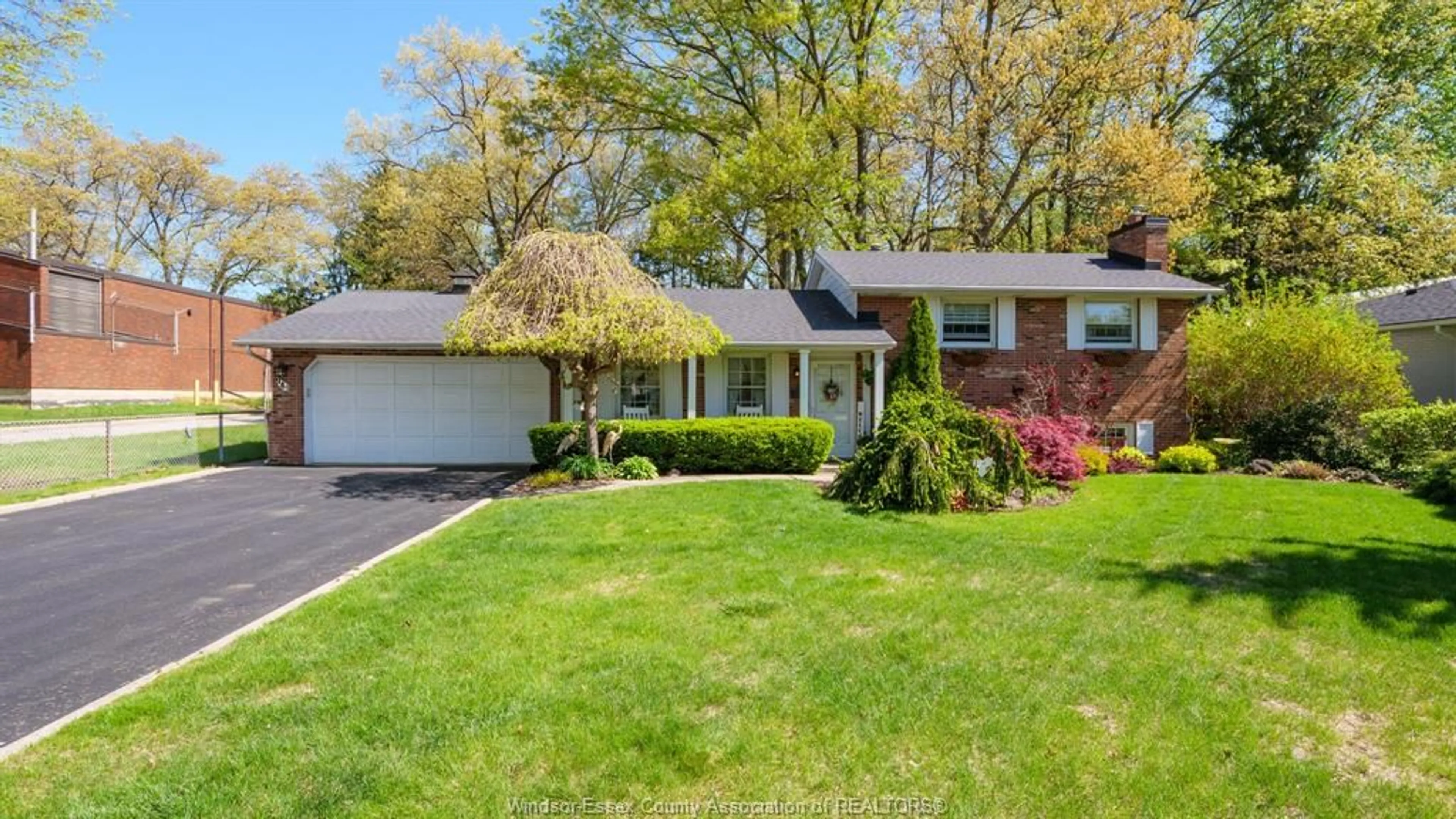 Home with vinyl exterior material, street for 945 Laurier Dr, LaSalle Ontario N9J 1M9