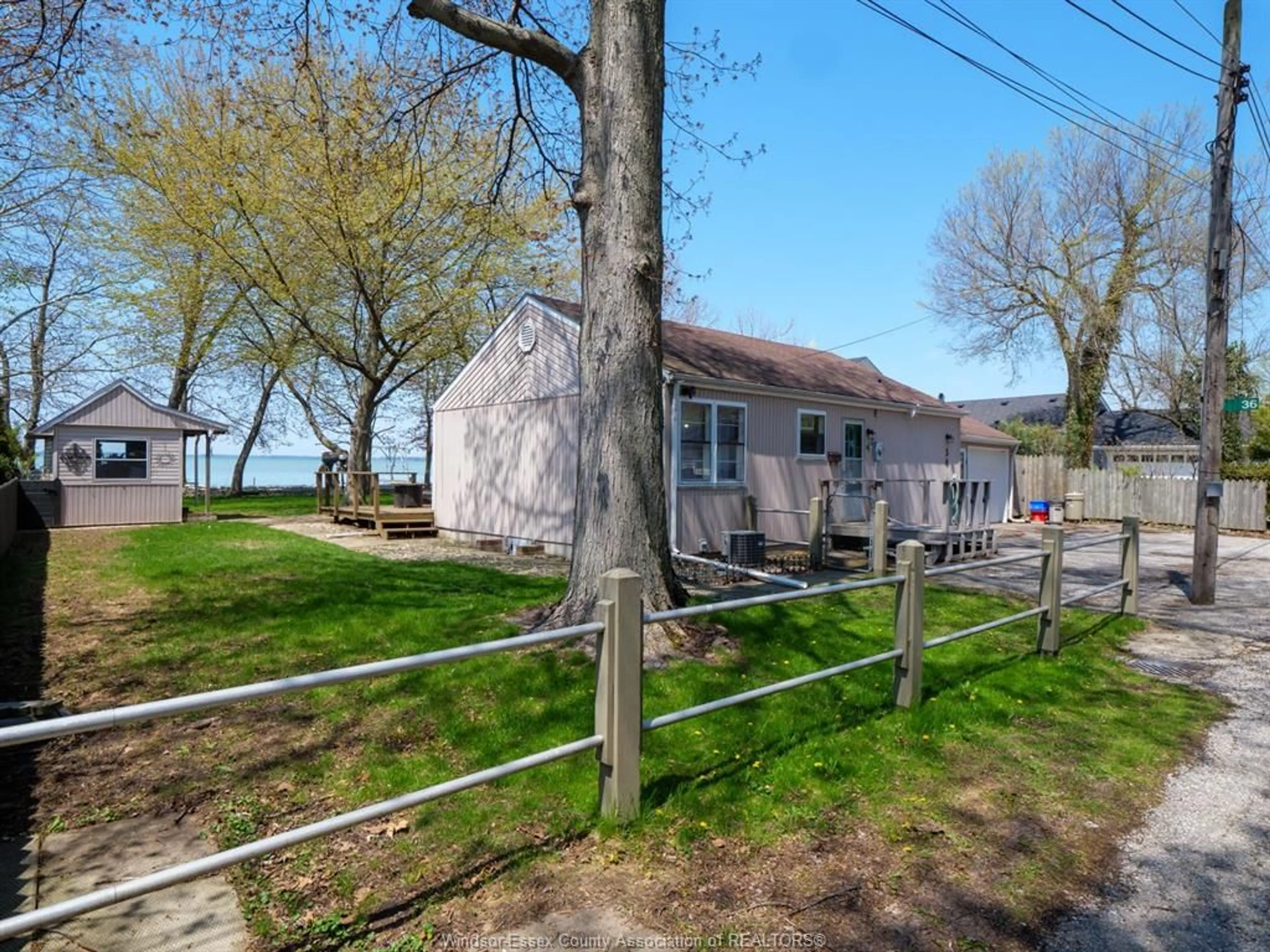 A pic from outside/outdoor area/front of a property/back of a property/a pic from drone, water/lake/river/ocean view for 36 Cooper Lane, Amherstburg Ontario N9V 1T3
