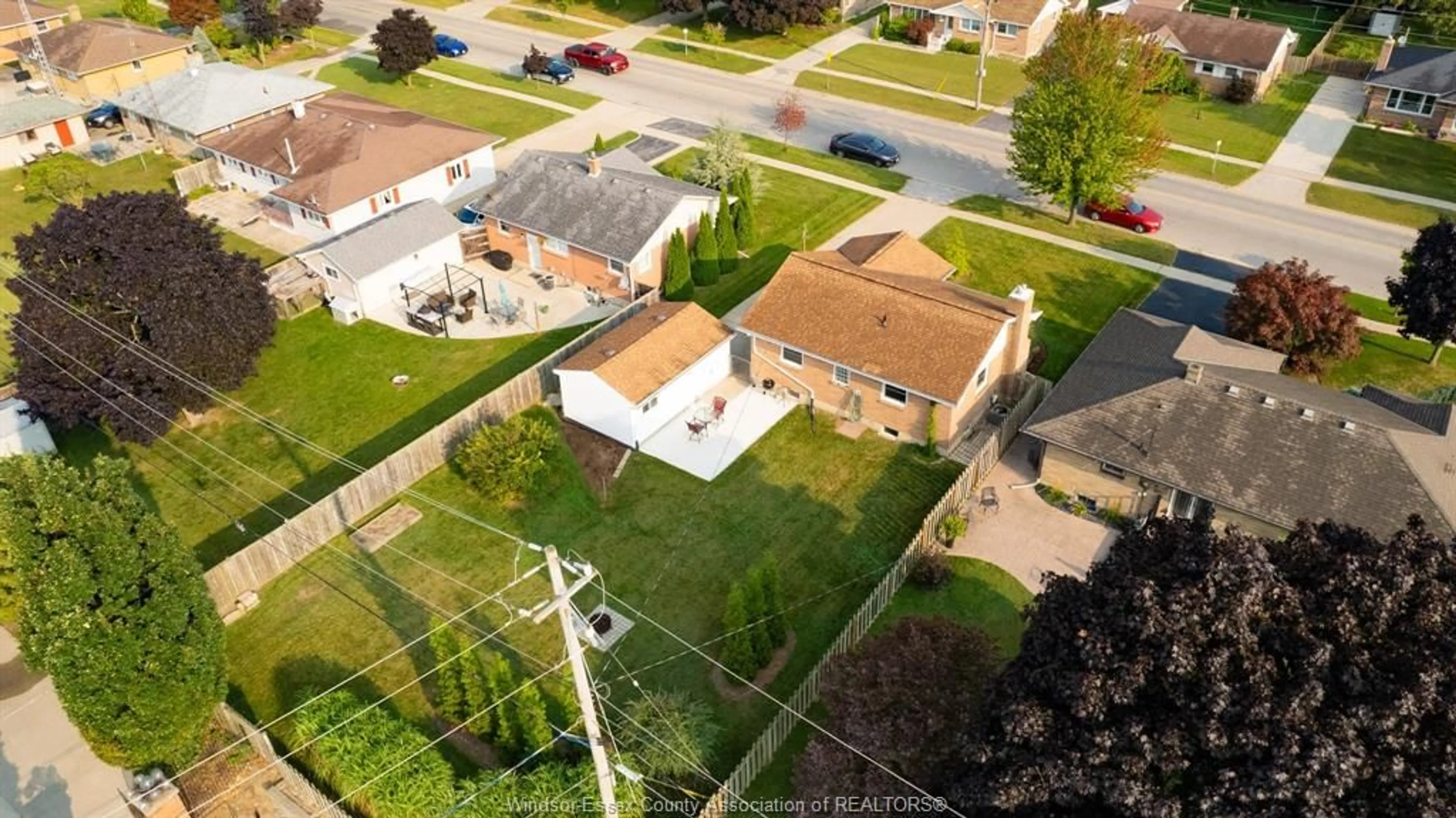 A pic from outside/outdoor area/front of a property/back of a property/a pic from drone, street for 12 PULFORD Ave, Leamington Ontario N8H 2J3