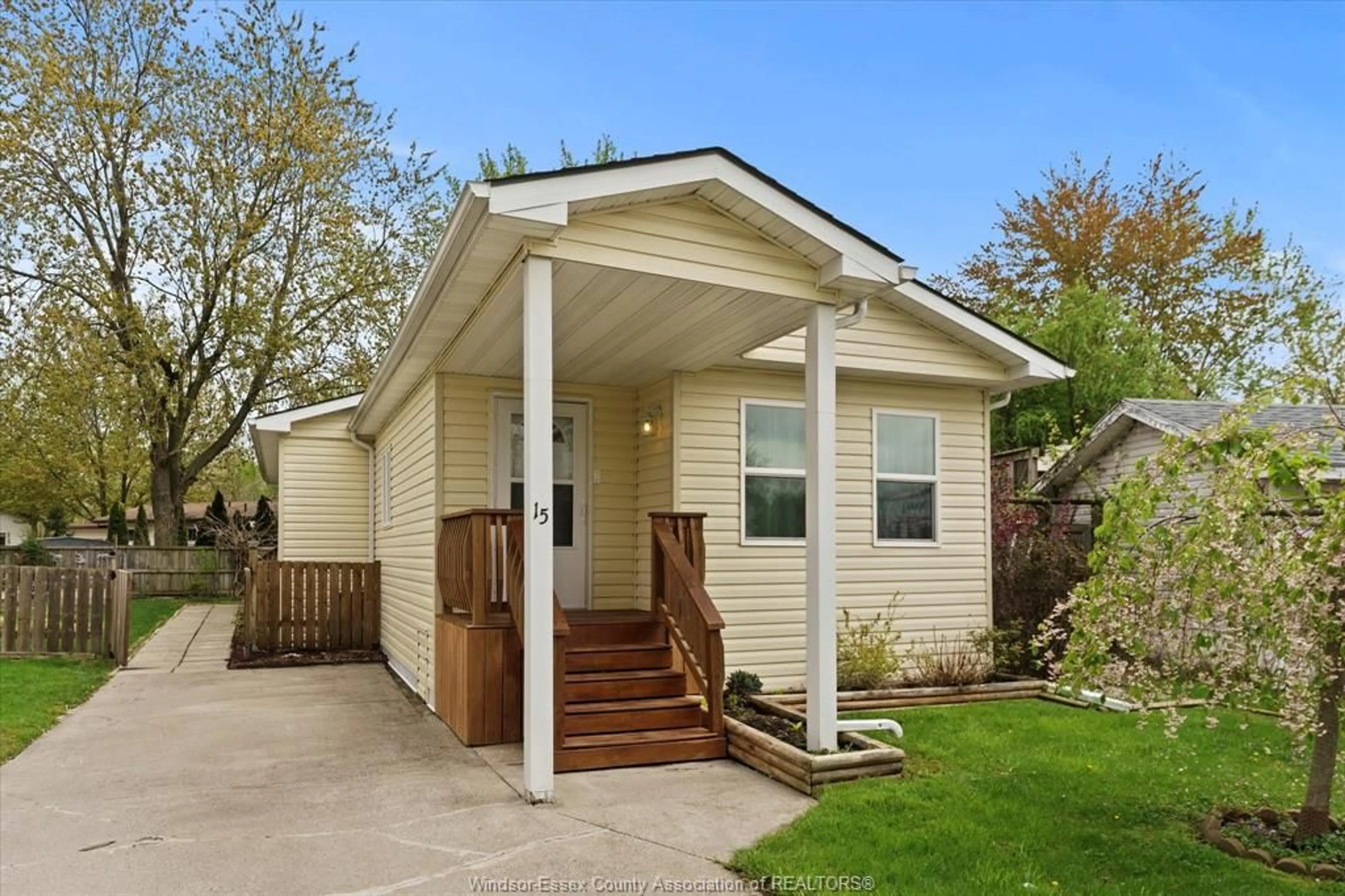 Home with vinyl exterior material, street for 15 SPRUCE St, McGregor Ontario N0R 1J0
