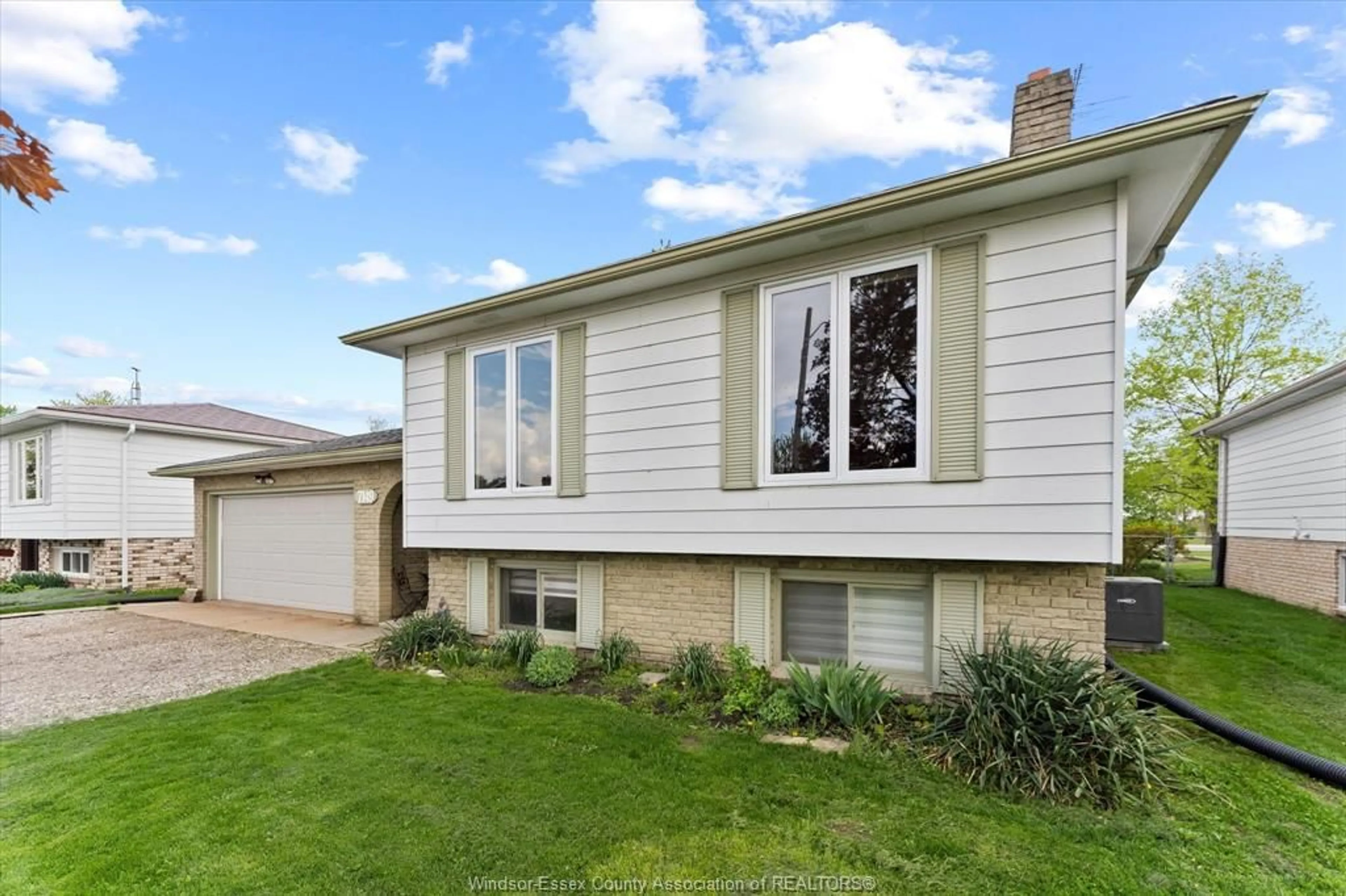 Home with vinyl exterior material, street for 7149 WILLIAM STREET, Lakeshore Ontario N0P 1J0