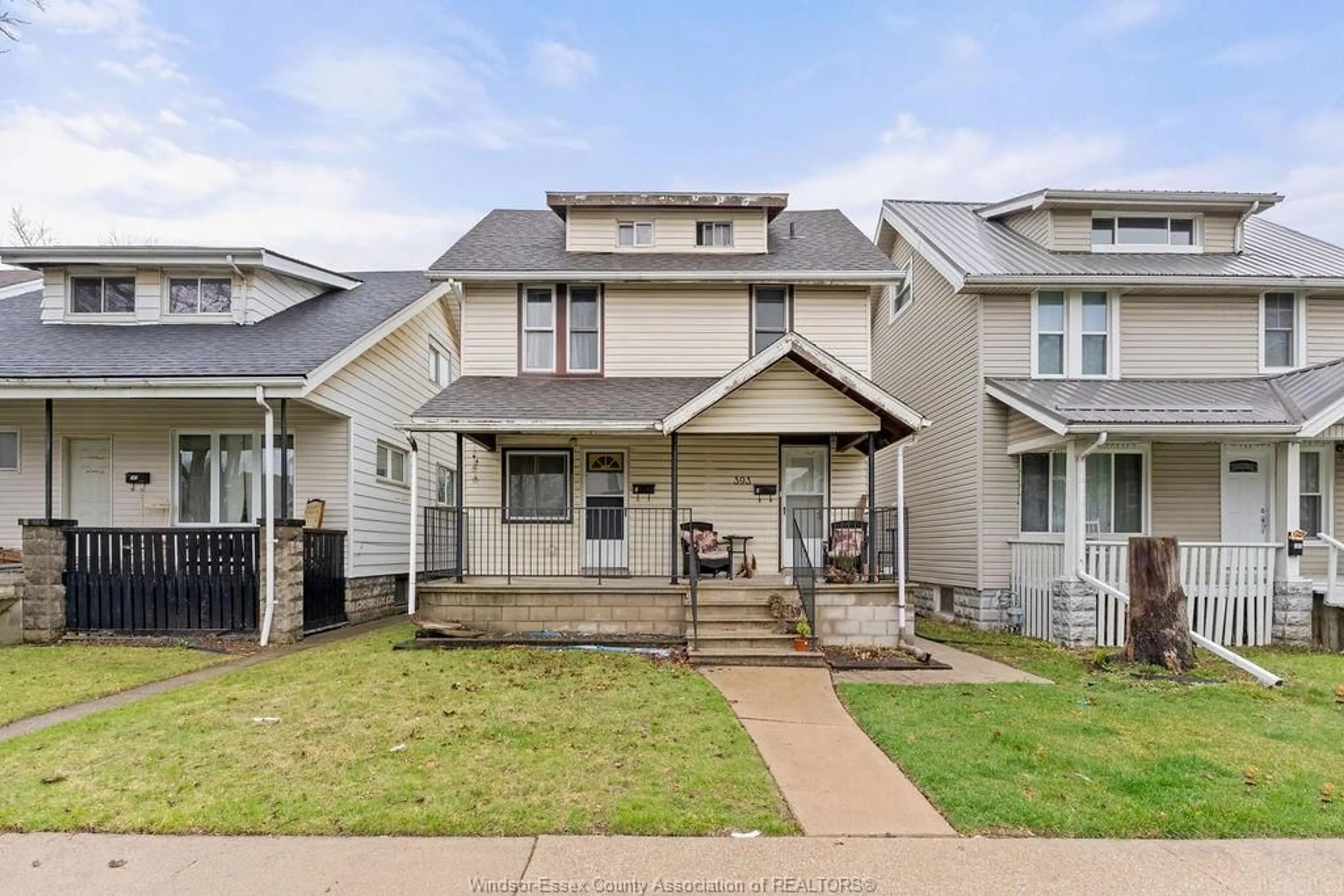 Home with vinyl exterior material, street for 393 ELM Ave, Windsor Ontario N9A 5H2
