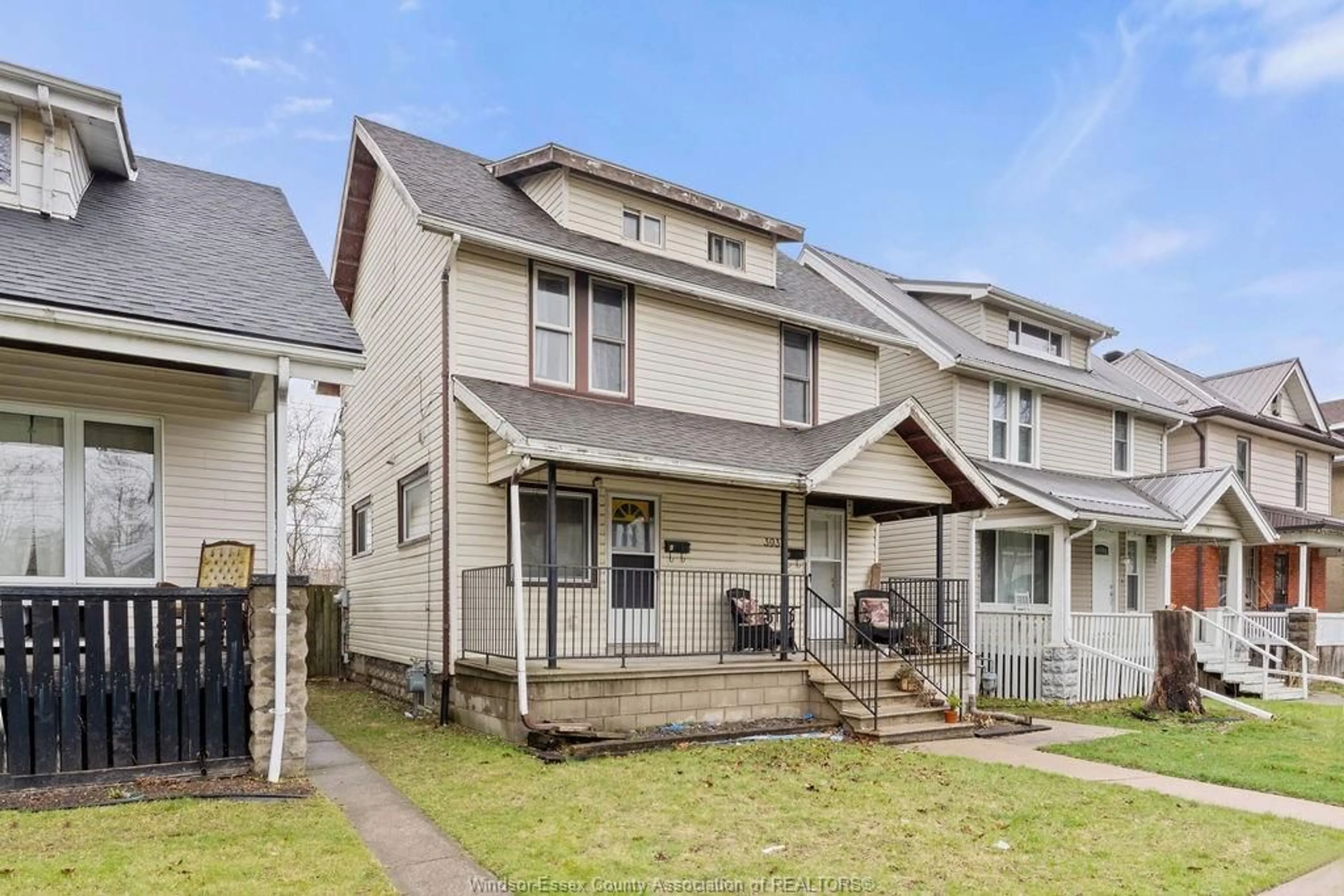 Home with vinyl exterior material, street for 393 ELM Ave, Windsor Ontario N9A 5H2