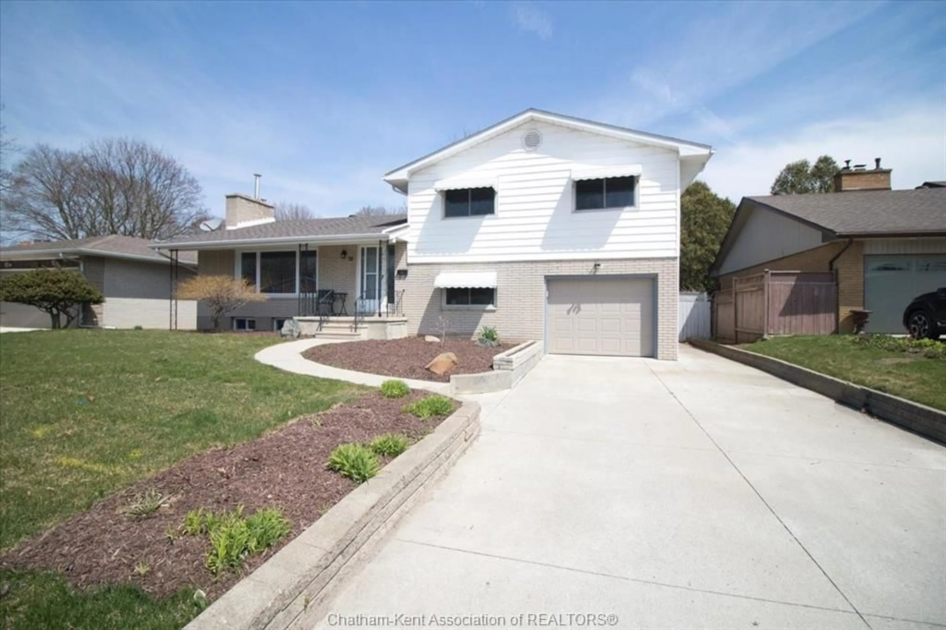 Home with vinyl exterior material, street for 39 Wyandott St, Chatham Ontario N7M 2T5