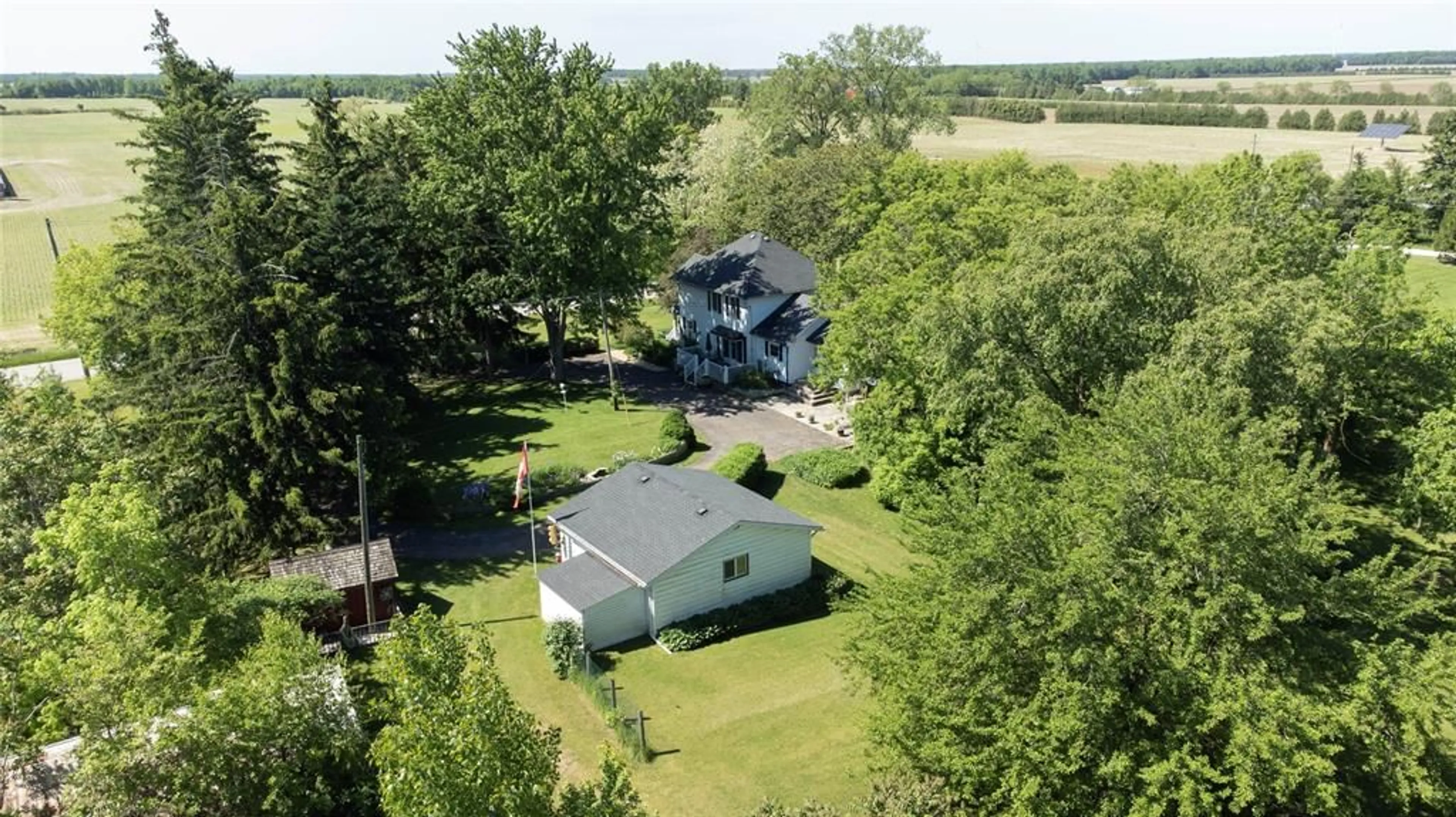 A pic from outside/outdoor area/front of a property/back of a property/a pic from drone, water/lake/river/ocean view for 5848 DOUGLAS Line, Plympton-Wyoming Ontario N0N 1J0
