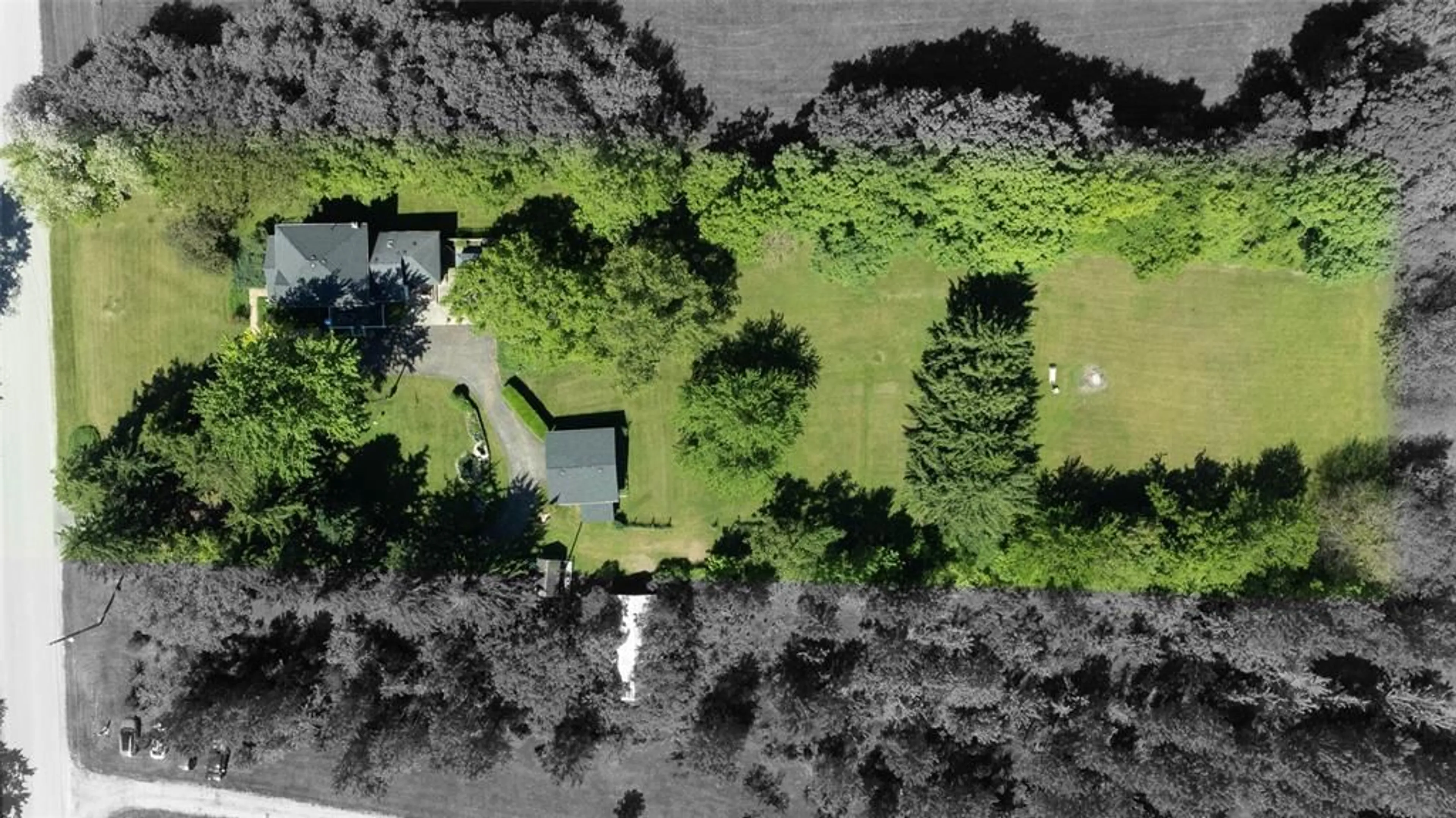 A pic from outside/outdoor area/front of a property/back of a property/a pic from drone, forest/trees view for 5848 DOUGLAS Line, Plympton-Wyoming Ontario N0N 1J0