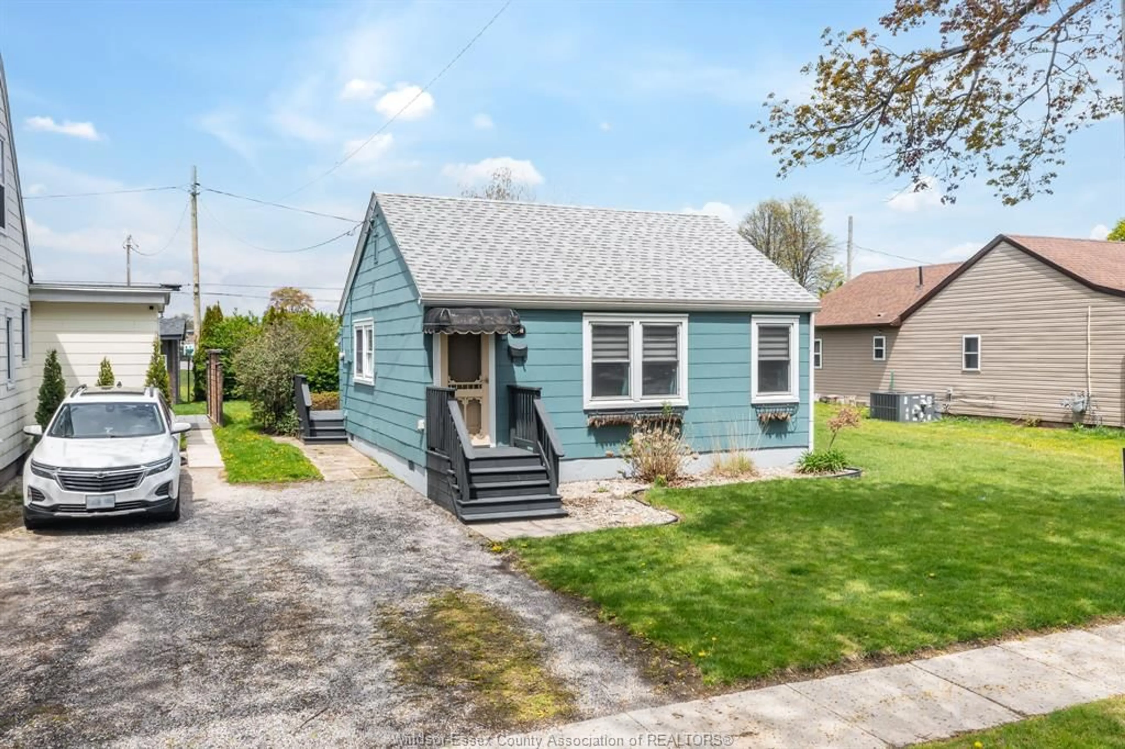 Home with vinyl exterior material, street for 103 ORANGE St, Leamington Ontario N8H 1R1
