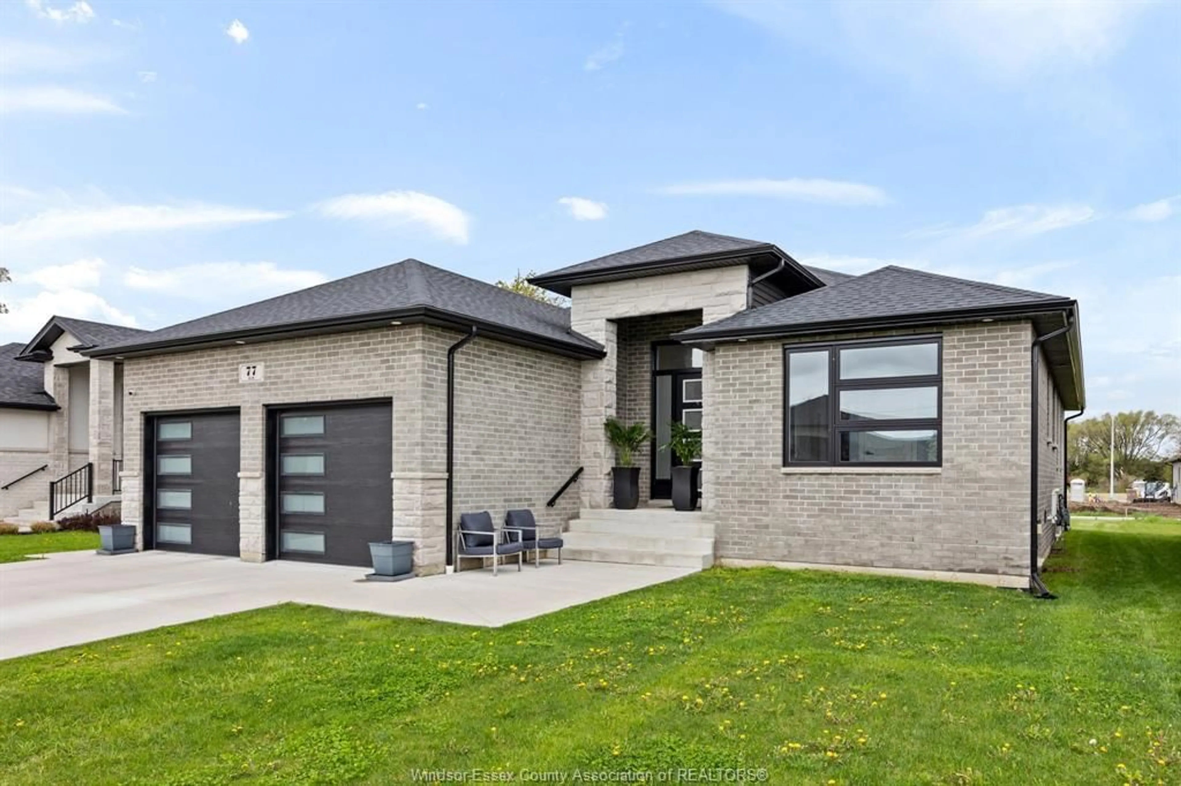 Home with brick exterior material, street for 77 OLIVE Dr, Leamington Ontario N8H 0E7